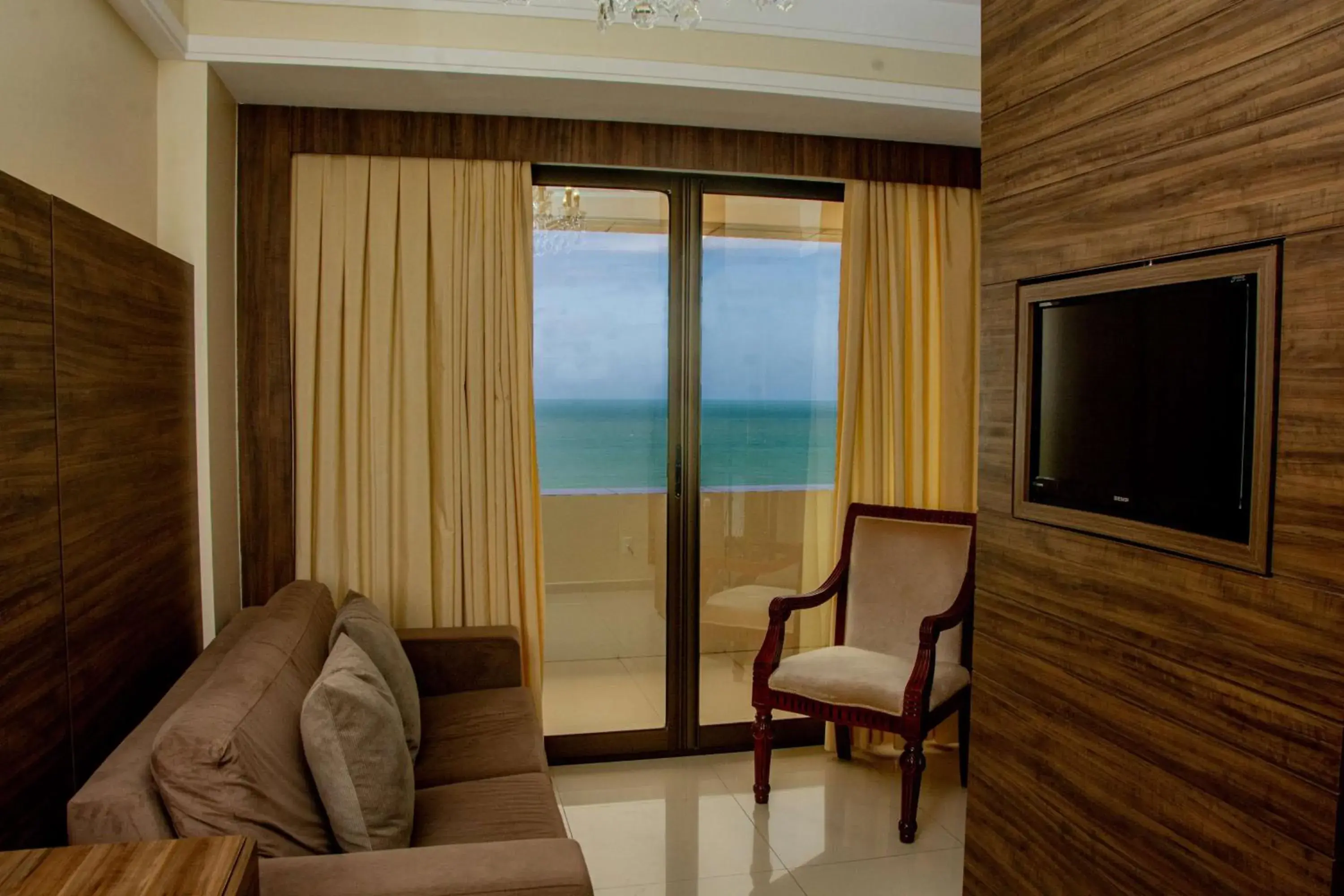 Photo of the whole room, Seating Area in Majestic Ponta Negra Beach,WorldHotels Elite