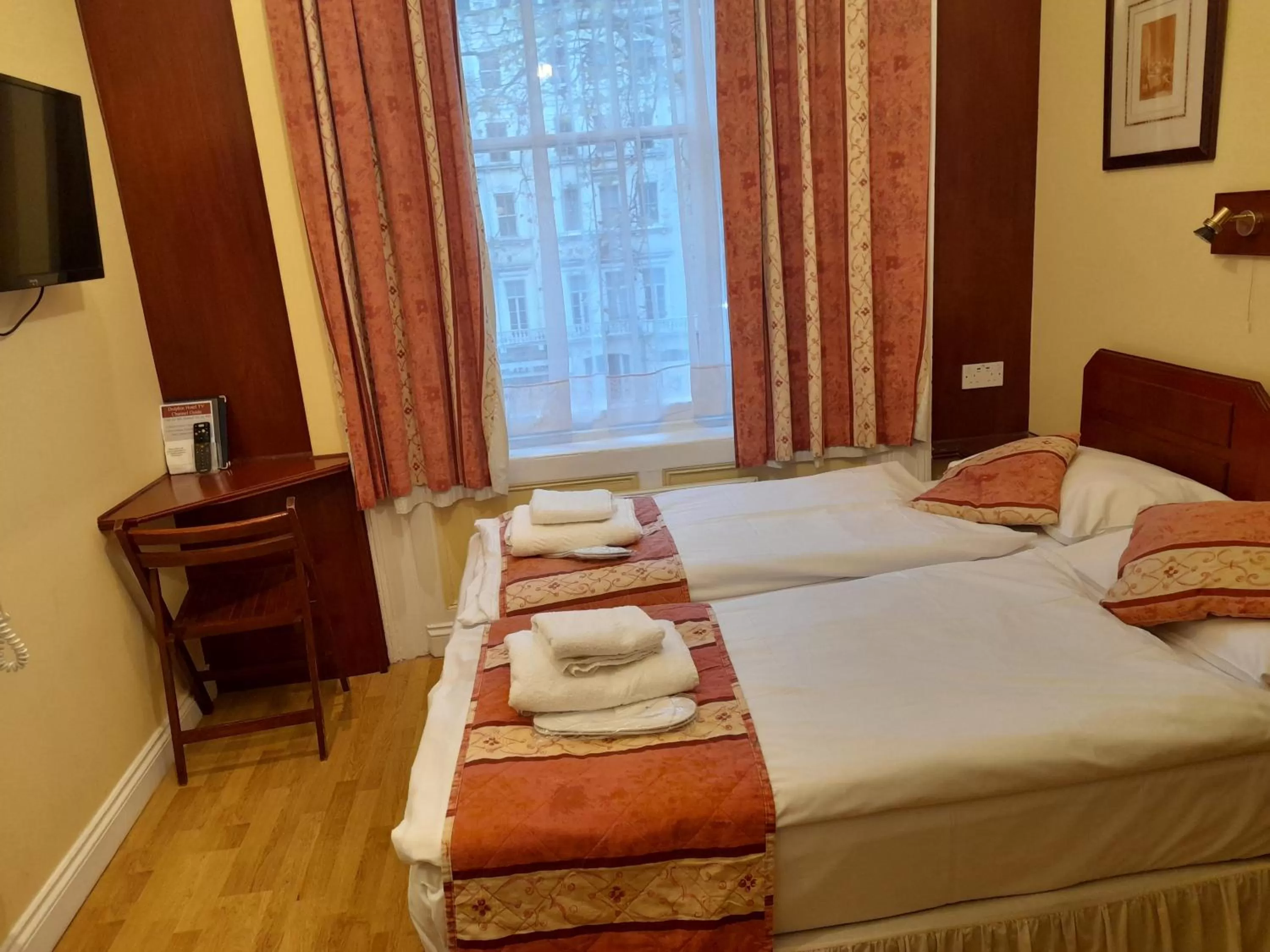 Bed in Dolphin Hotel