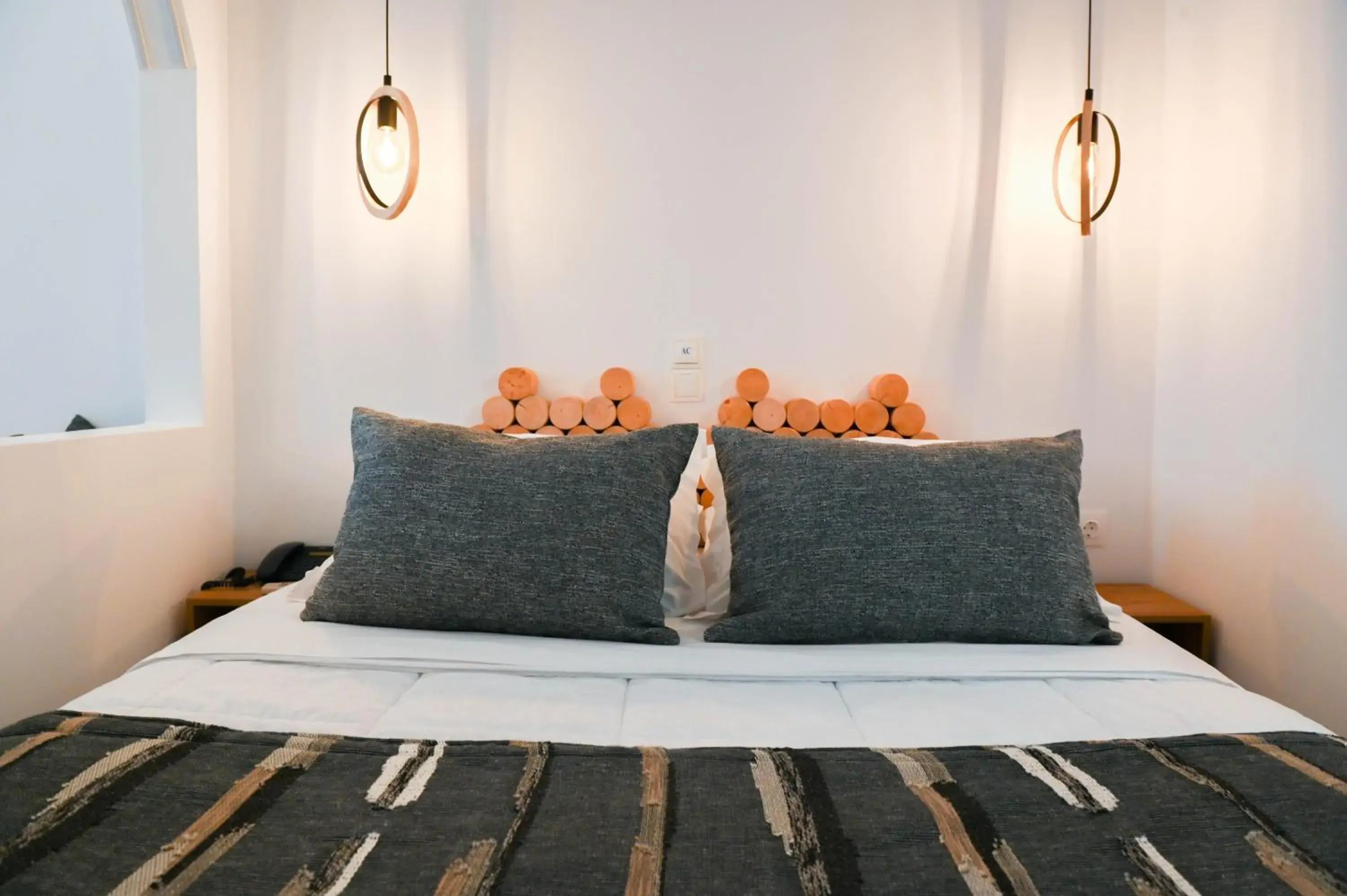 Bed in Amerisa Suites