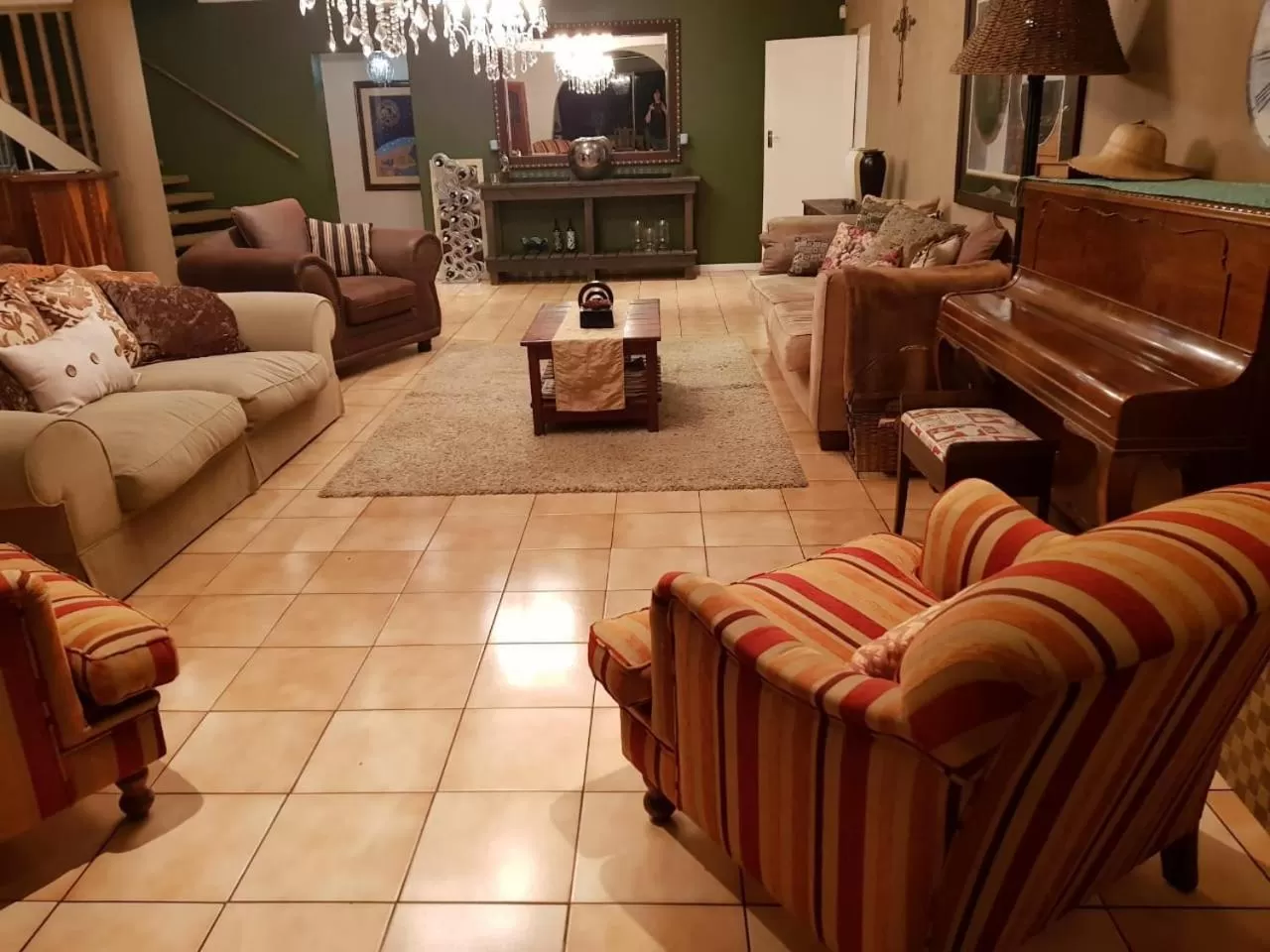 Communal lounge/ TV room in Umuzi Guest House