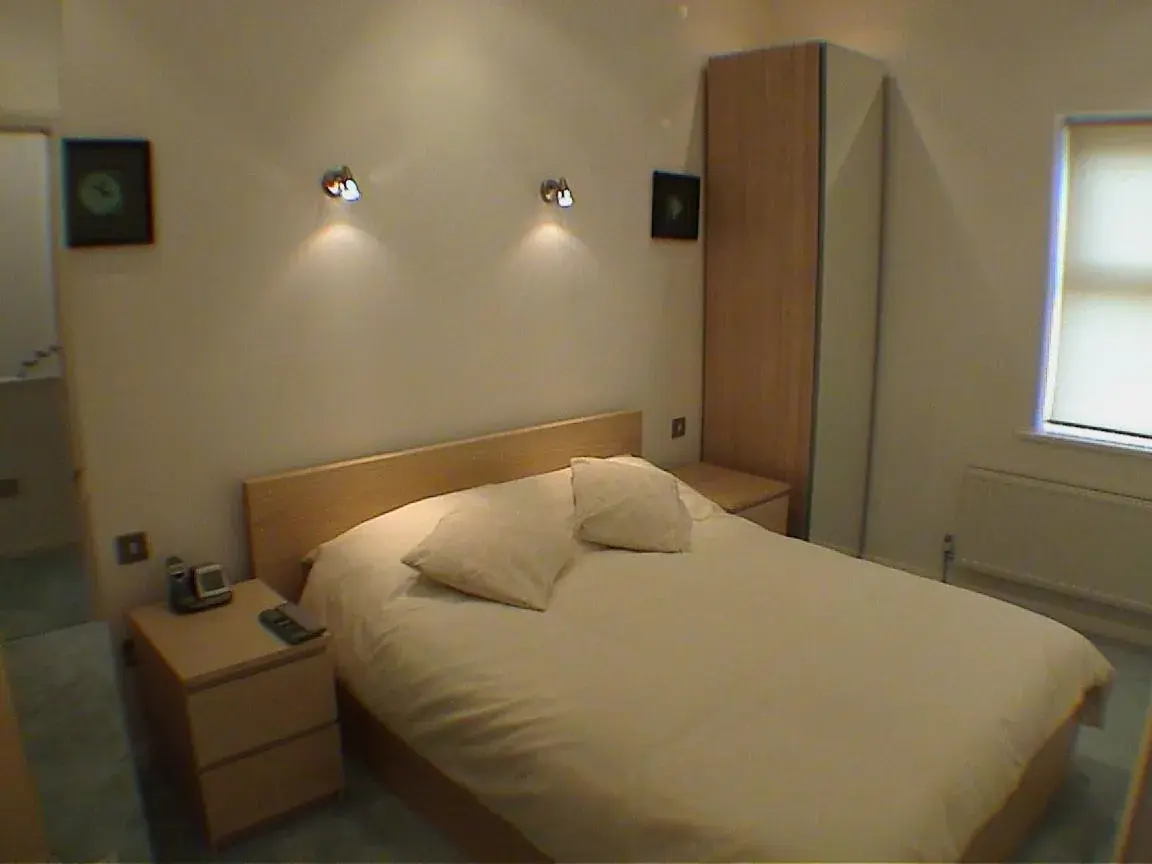Bed in Earle House Serviced Apartments