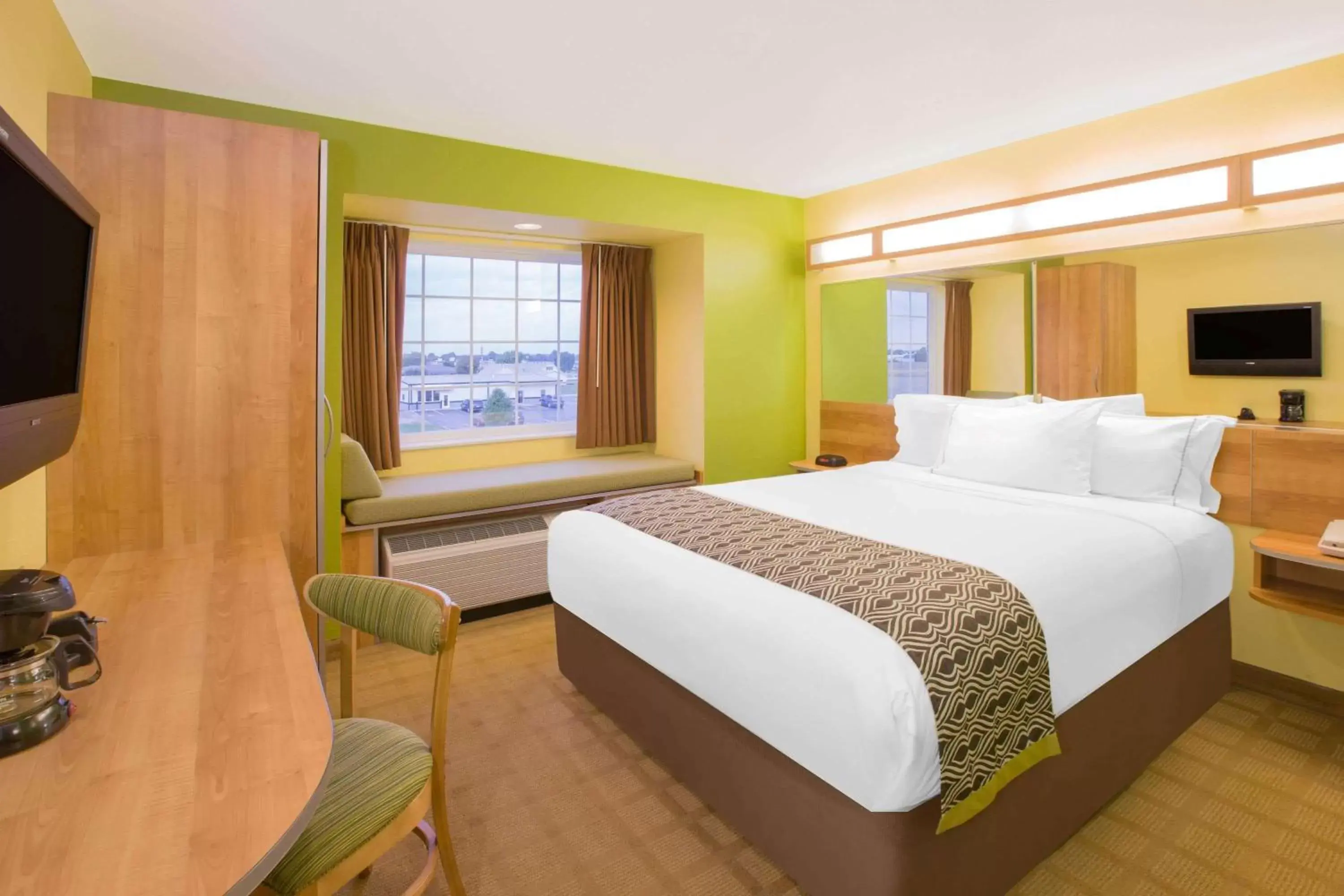 Photo of the whole room, Bed in Microtel Inn & Suites by Wyndham Delphos