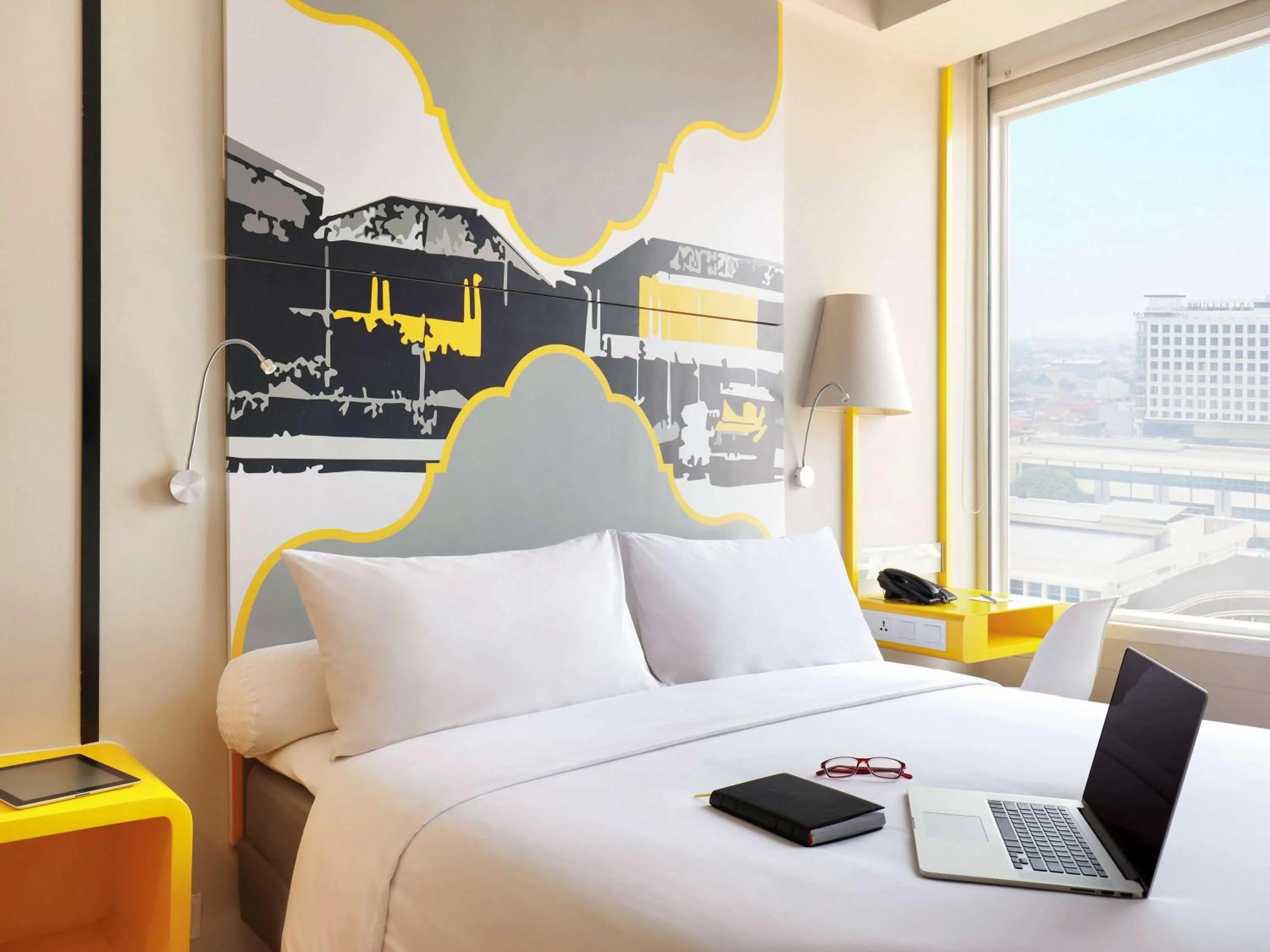 Photo of the whole room, Bed in KIMAYA Braga Bandung by HARRIS