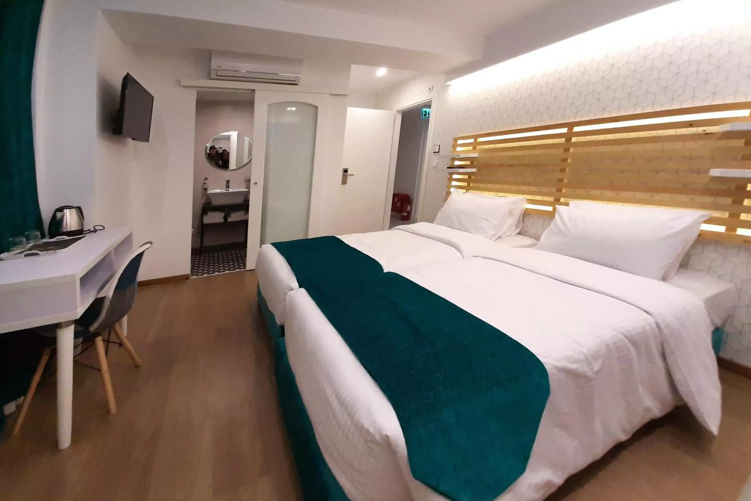 Bed in Athenian Montaza Hotel Bed in Athenian Montaza Hotel