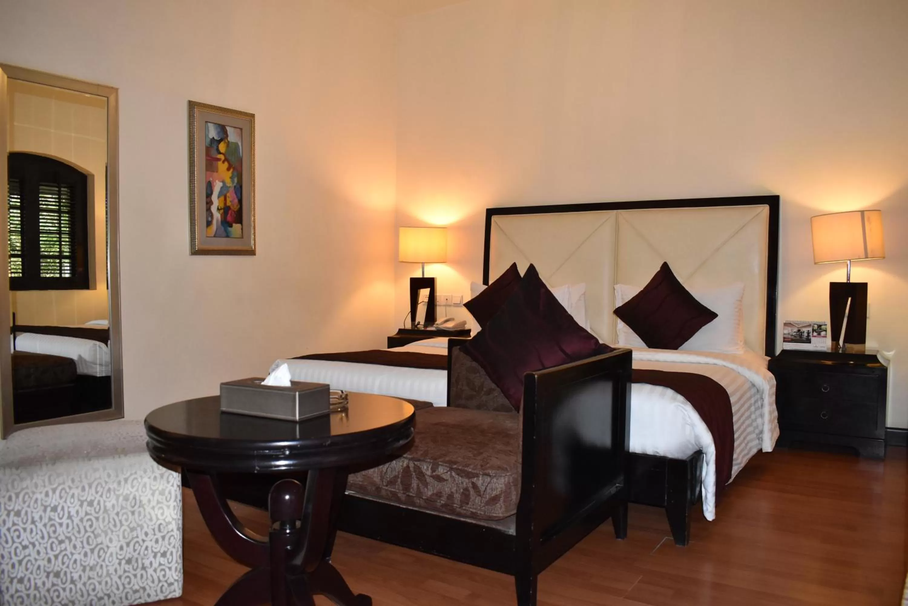 Bed in Ramada Plaza by Wyndham Karachi Airport Hotel