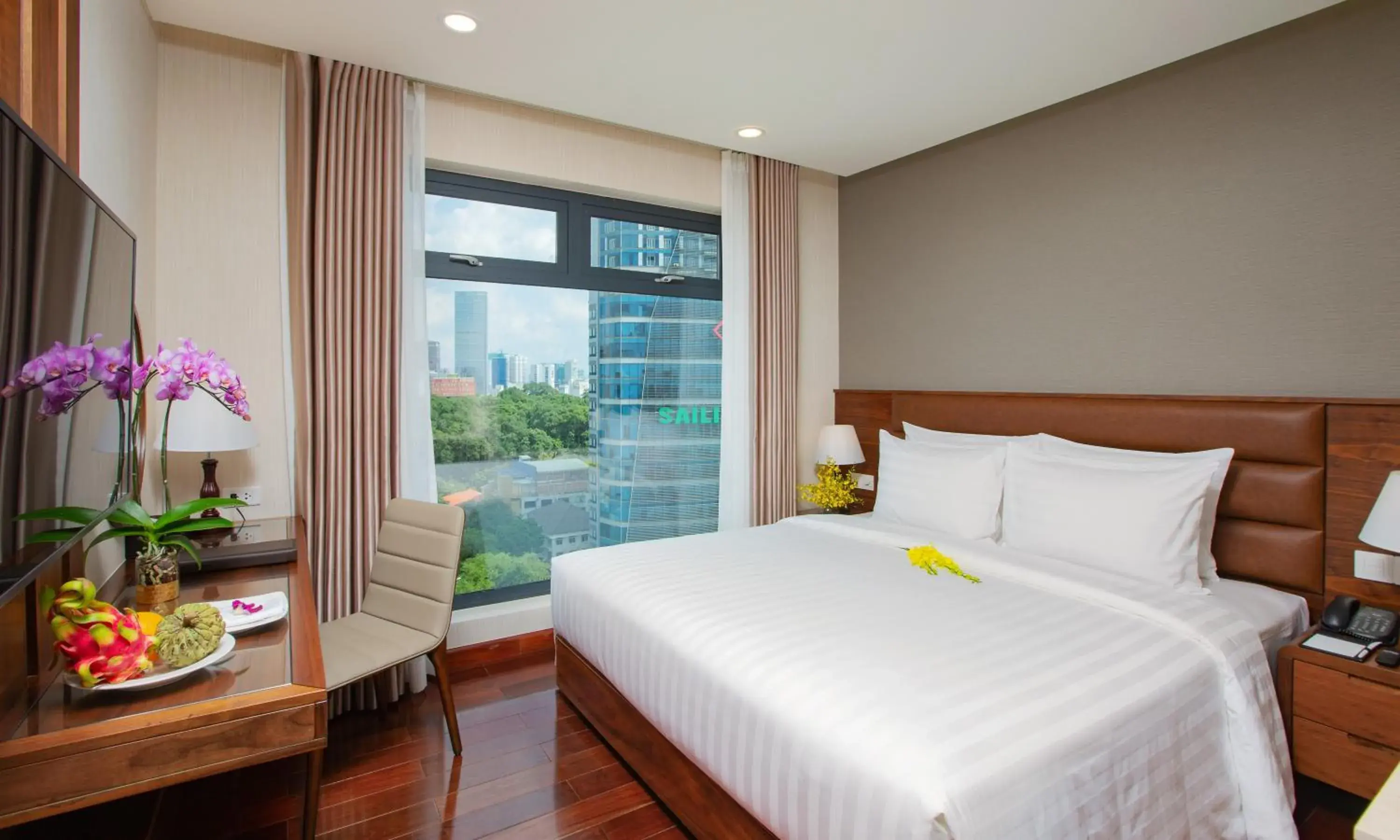 City view, Bed in Orchids Saigon Hotel