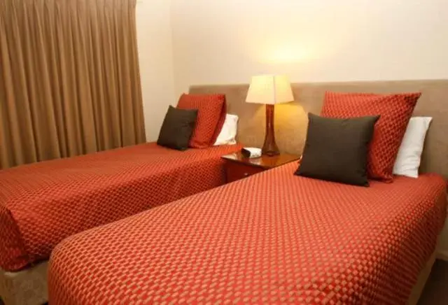 Bed in Waterview Luxury Apartments