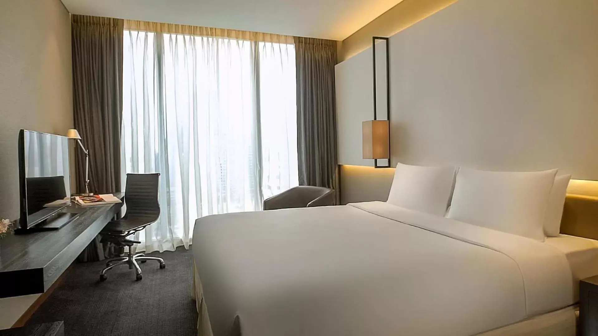 Bed in Amara Bangkok Hotel