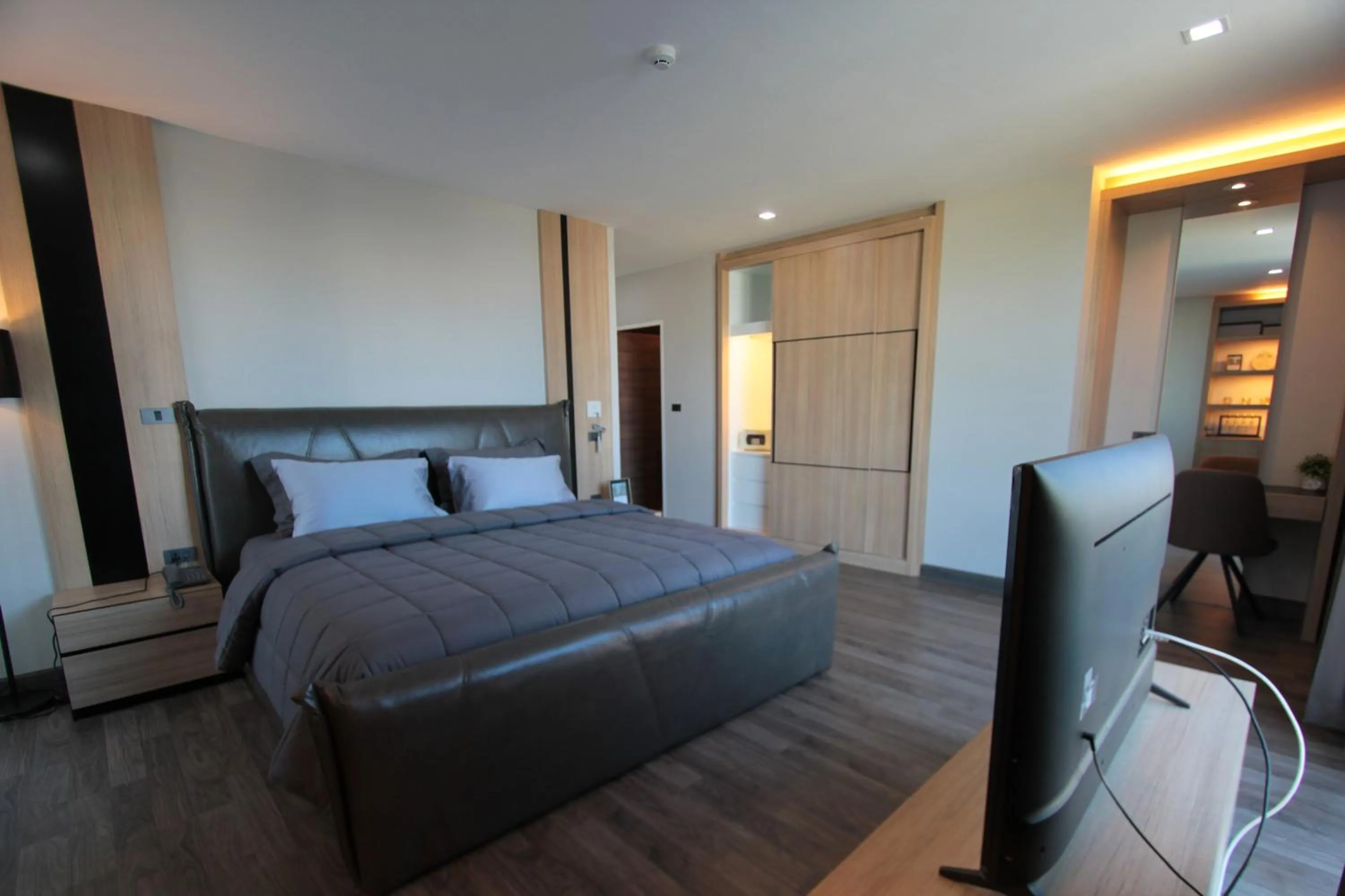 Bed in Wellness Chiang Mai Hotel