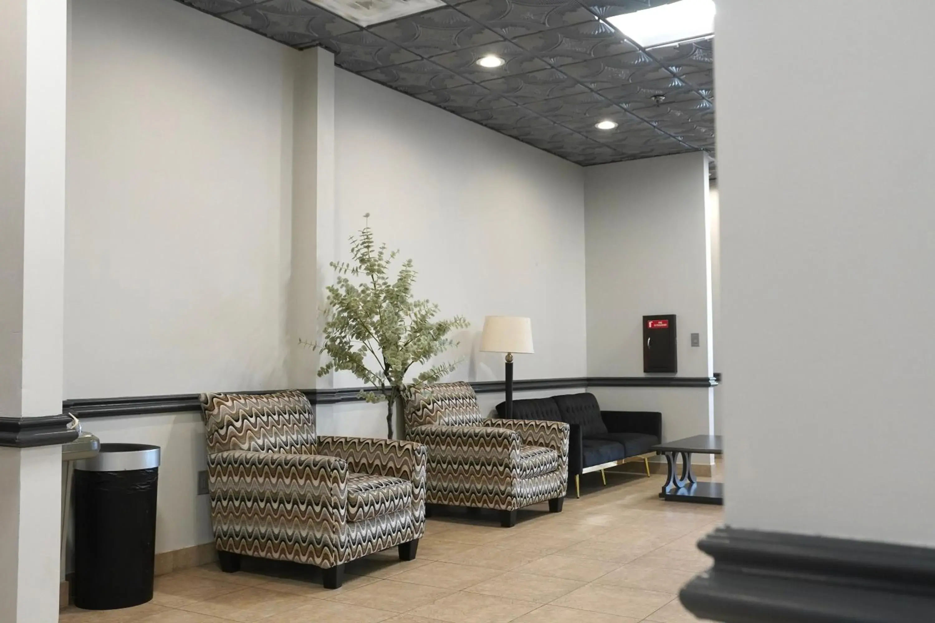 Lobby or reception, Seating Area in American Inn & Suites