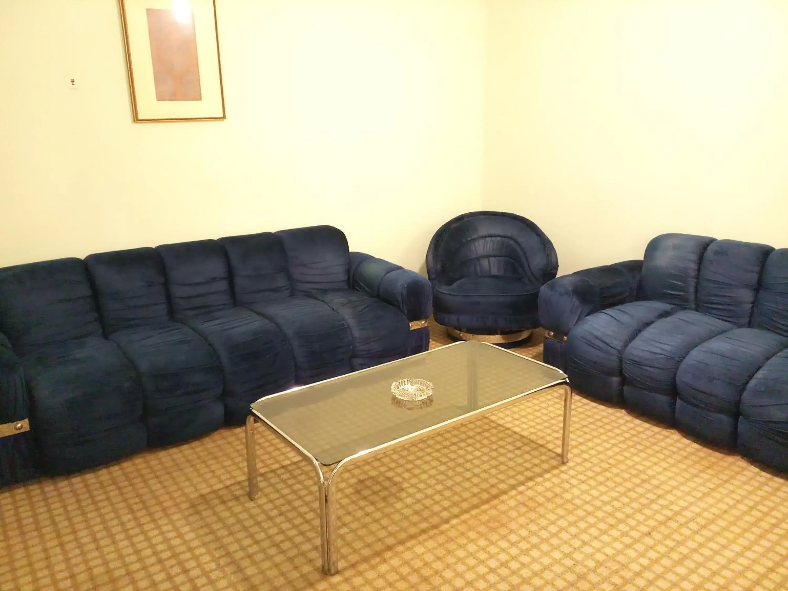 Living room, Seating Area in Oriental Palace Hotel