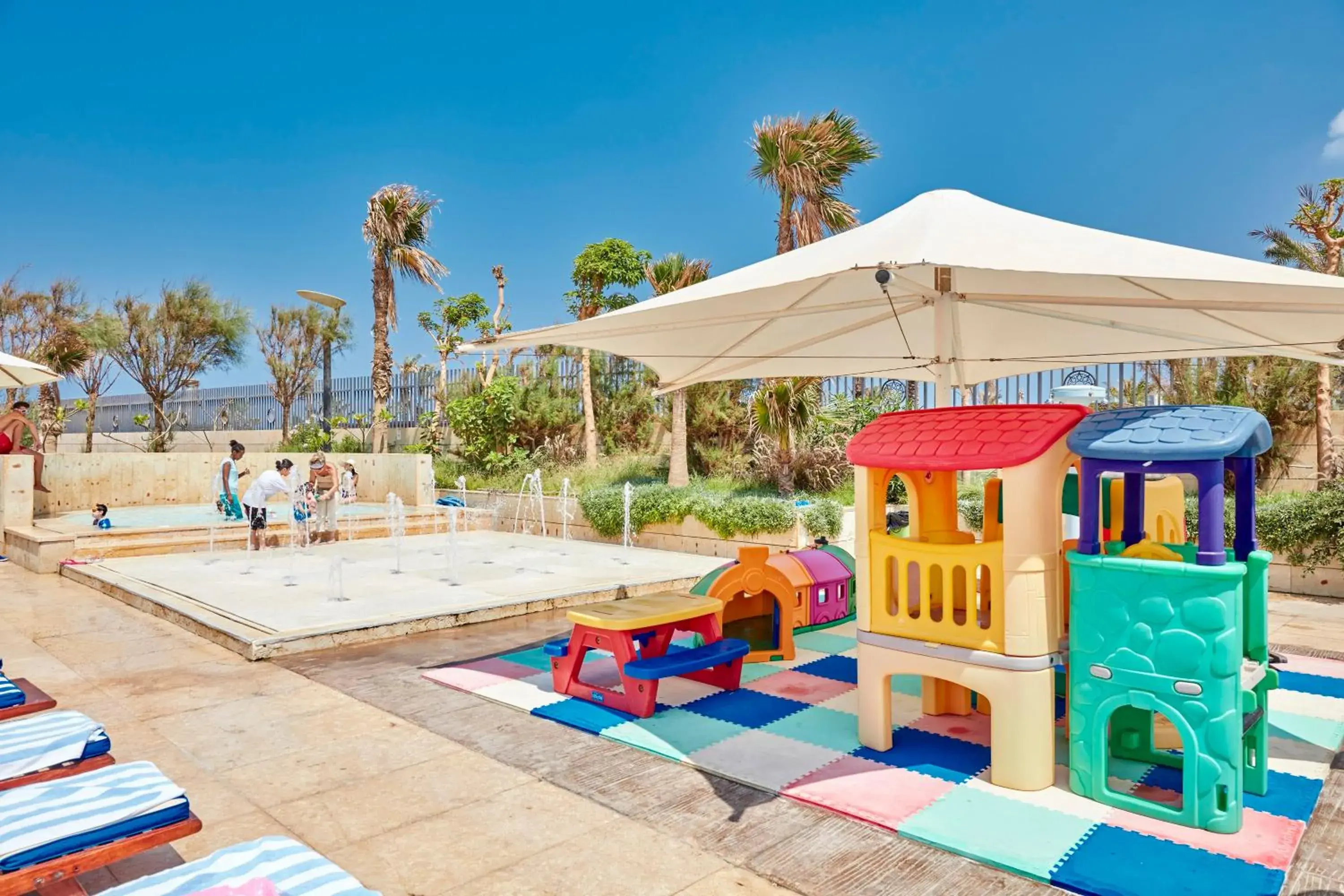 Children play ground, Swimming Pool in Coral Beach Hotel And Resort Beirut