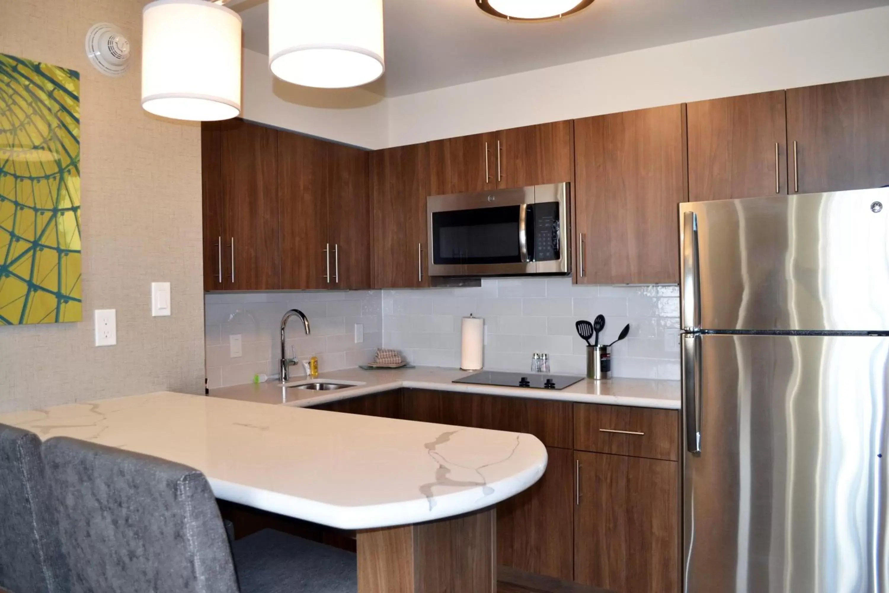 Photo of the whole room, Kitchen/Kitchenette in Staybridge Suites - Red Deer North, an IHG Hotel