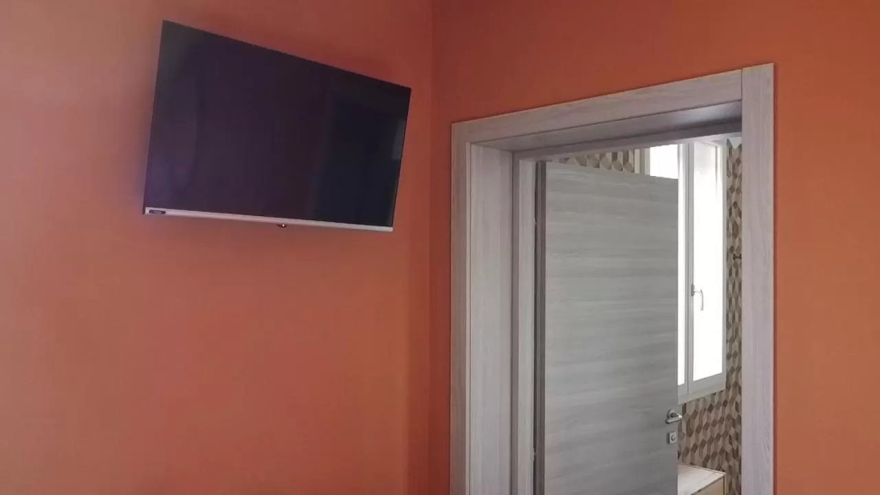 TV/Entertainment Center in Sala dell Estate Guest House