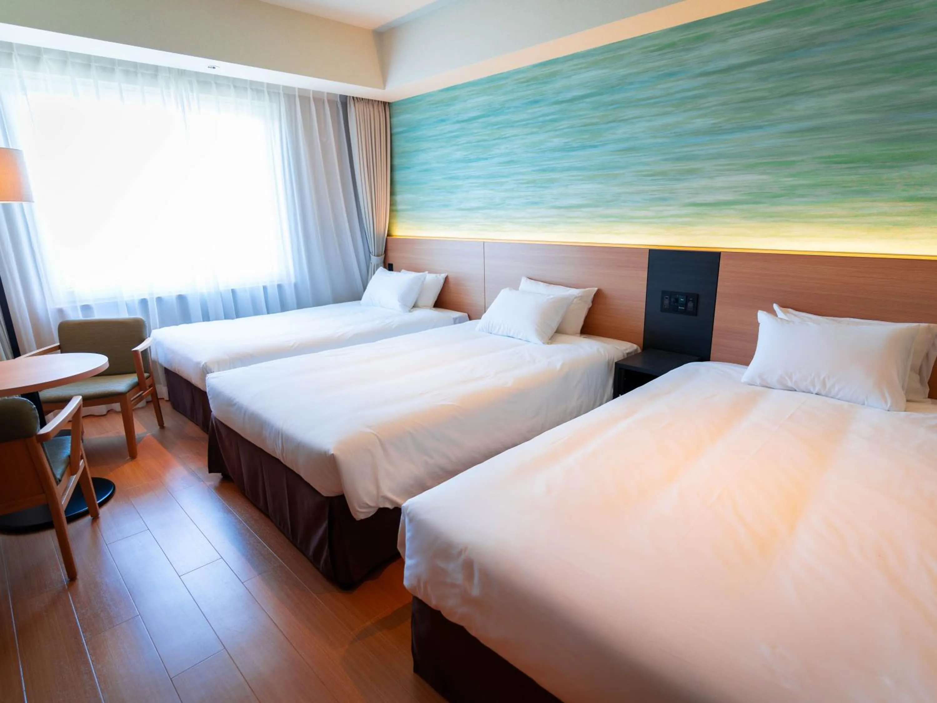 Bed in Hakodate Yunokawa Onsen Umi to Akari Hewitt Resort