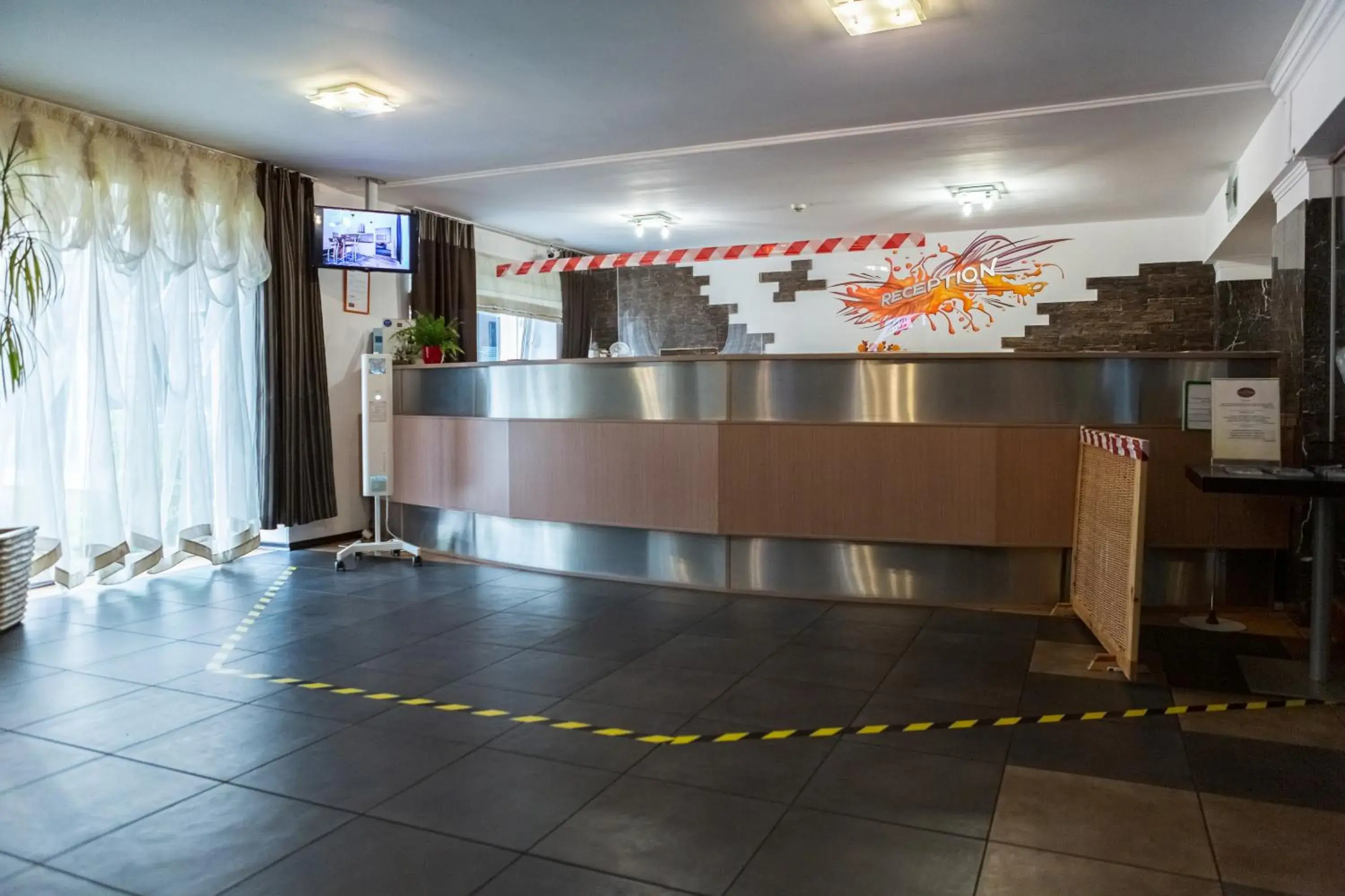 Lobby or reception in Apart Hotel Tomo FREE PARKING