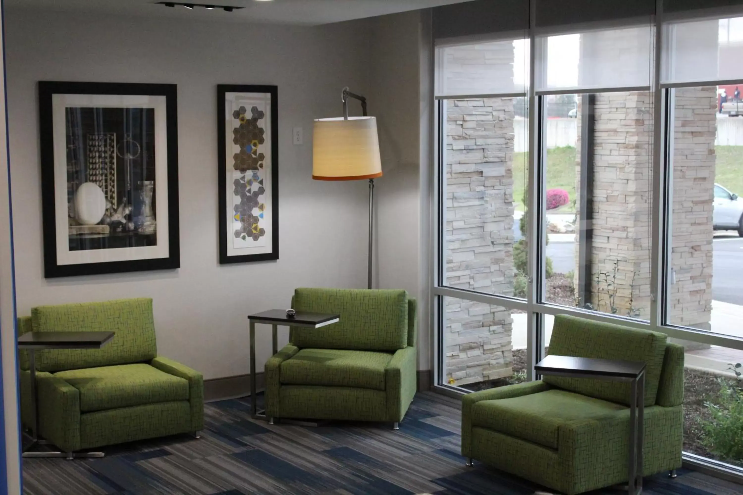 Property building, Seating Area in Holiday Inn Express & Suites - Milledgeville, an IHG Hotel