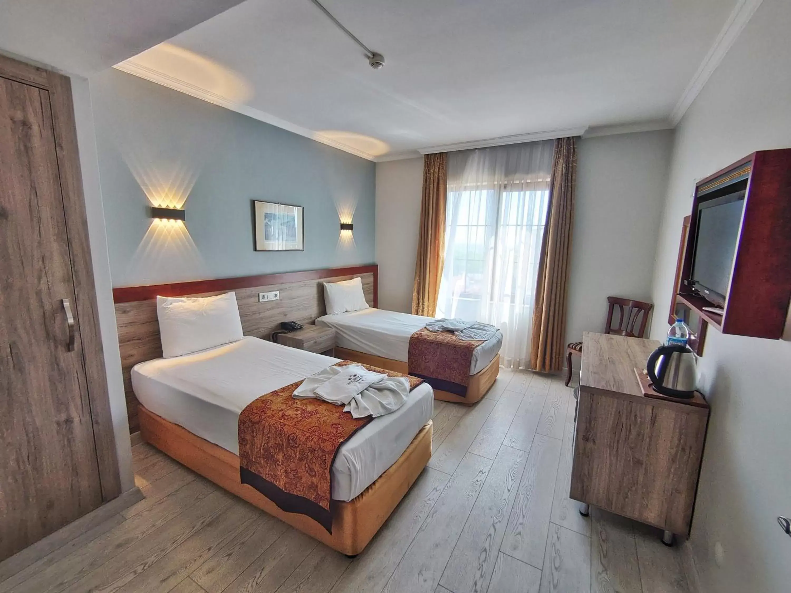 Bedroom in Orient Mintur Hotel