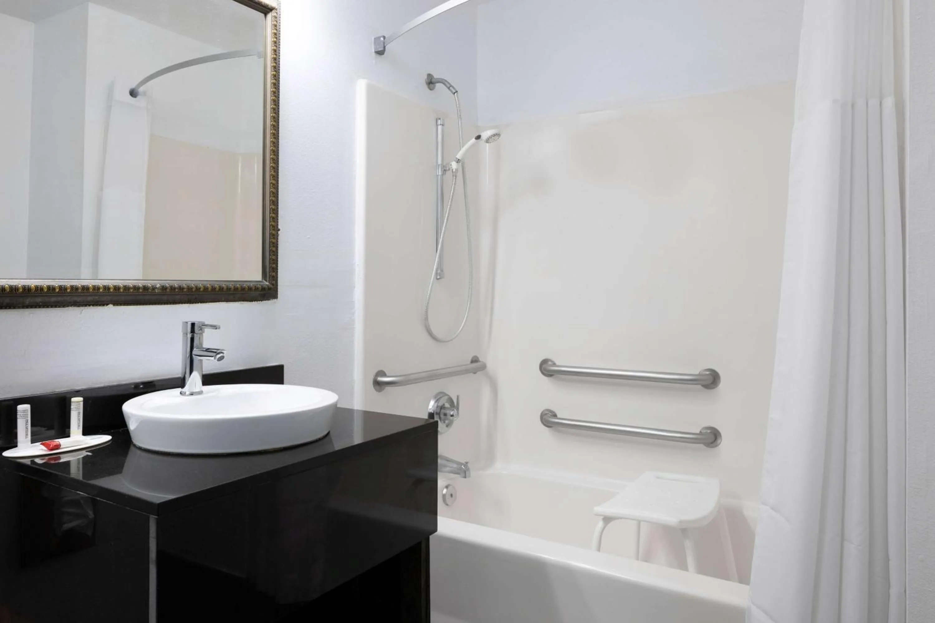 Bathroom in Super 8 by Wyndham Pensacola