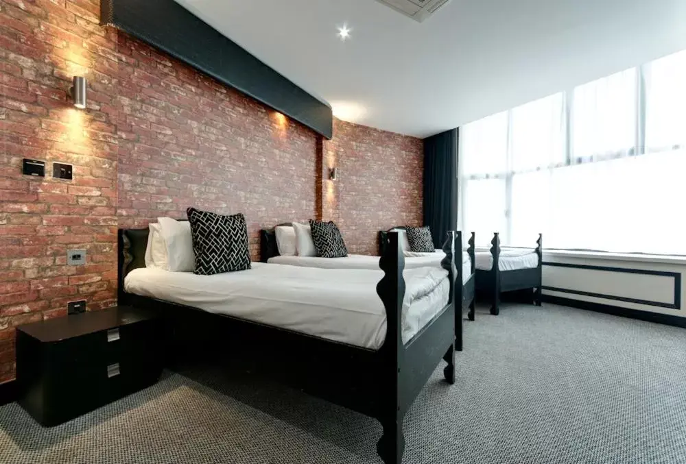 Bed in Print Works Hotel