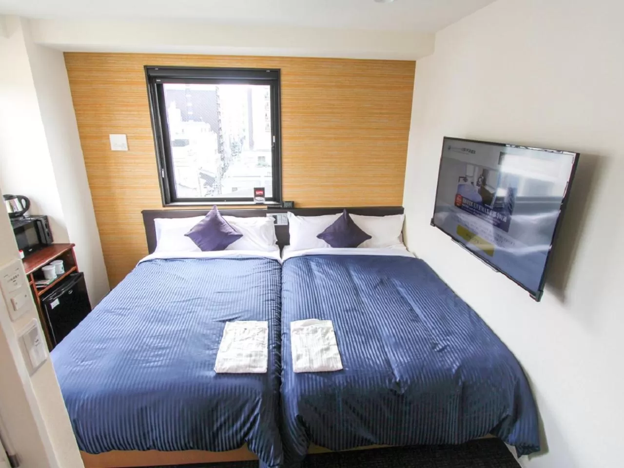 Bed in HOTEL LiVEMAX Kyoto Teramachidori