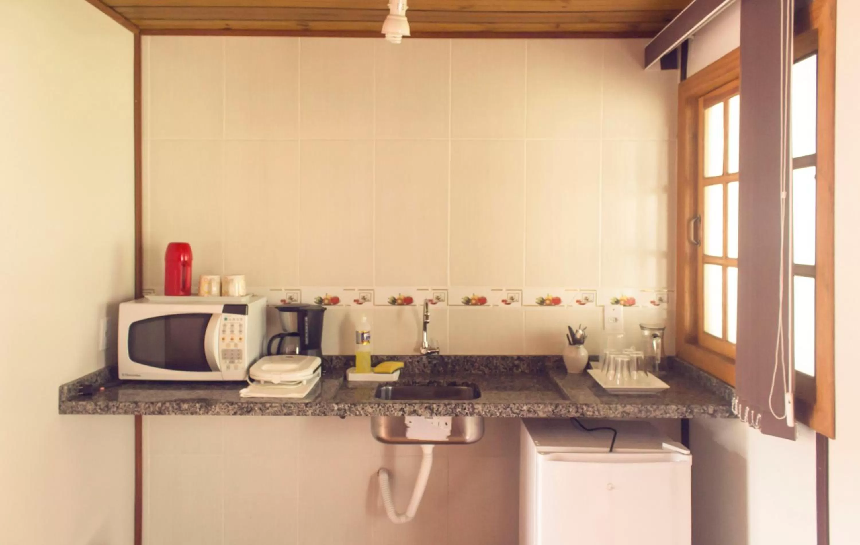 Kitchen or kitchenette, Kitchen/Kitchenette in Pousada Ilha da Magia