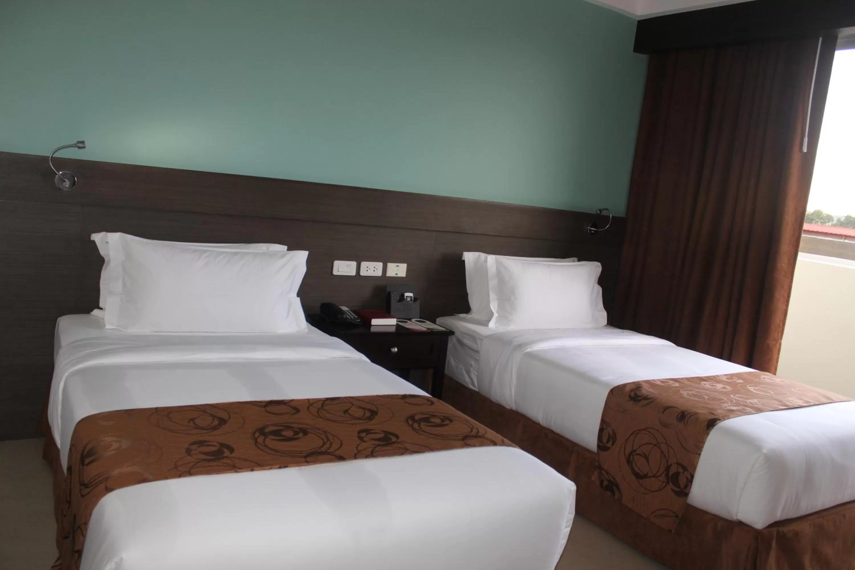 Bed in Kew Hotel Tagbilaran
