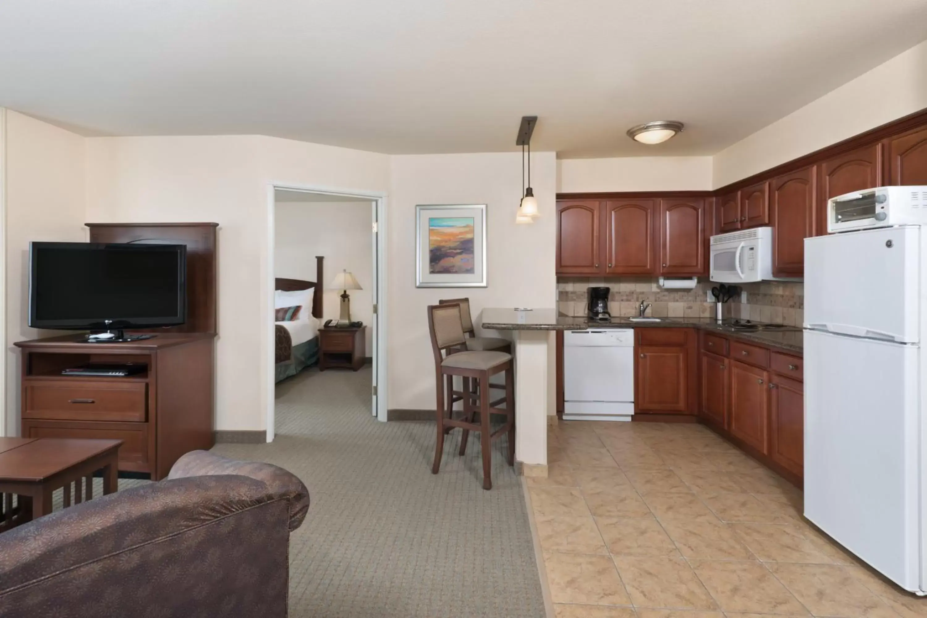 Photo of the whole room, Kitchen/Kitchenette in Staybridge Suites Tucson Airport, an IHG Hotel