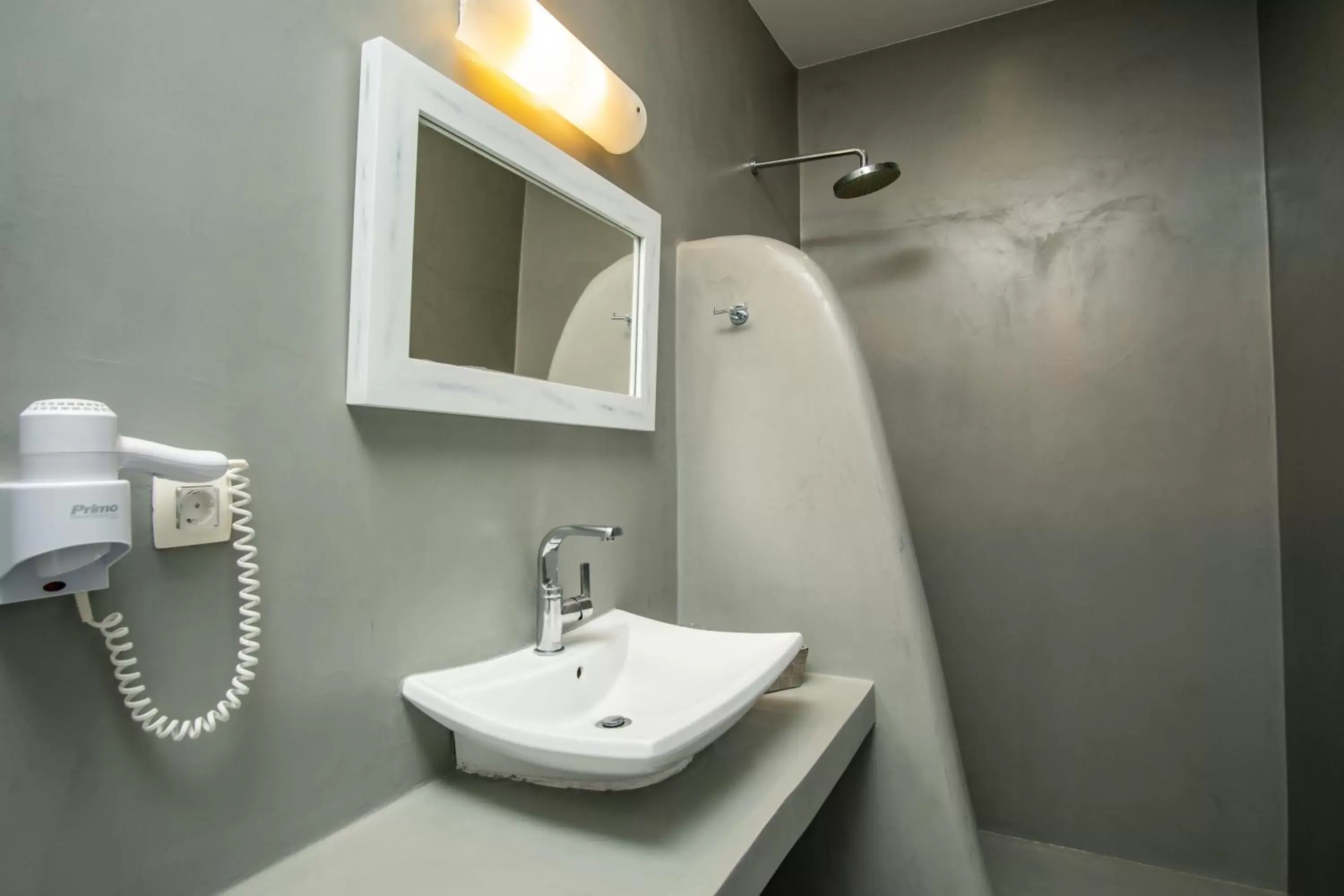 Bathroom in Central Fira Suites