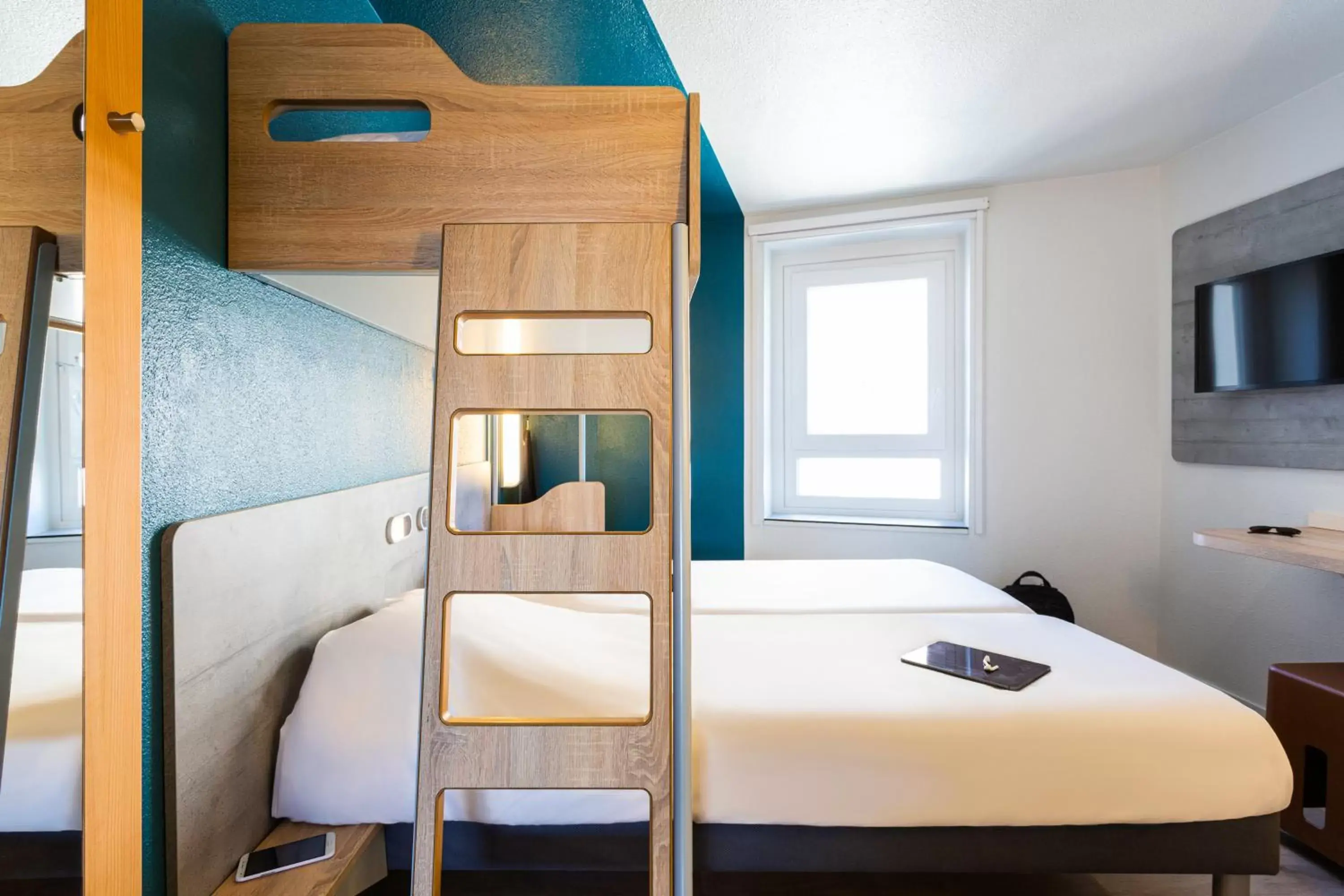 Triple Room with Two Single Beds and One Bunk Bed in ibis budget Bordeaux Centre - Gare Saint Jean