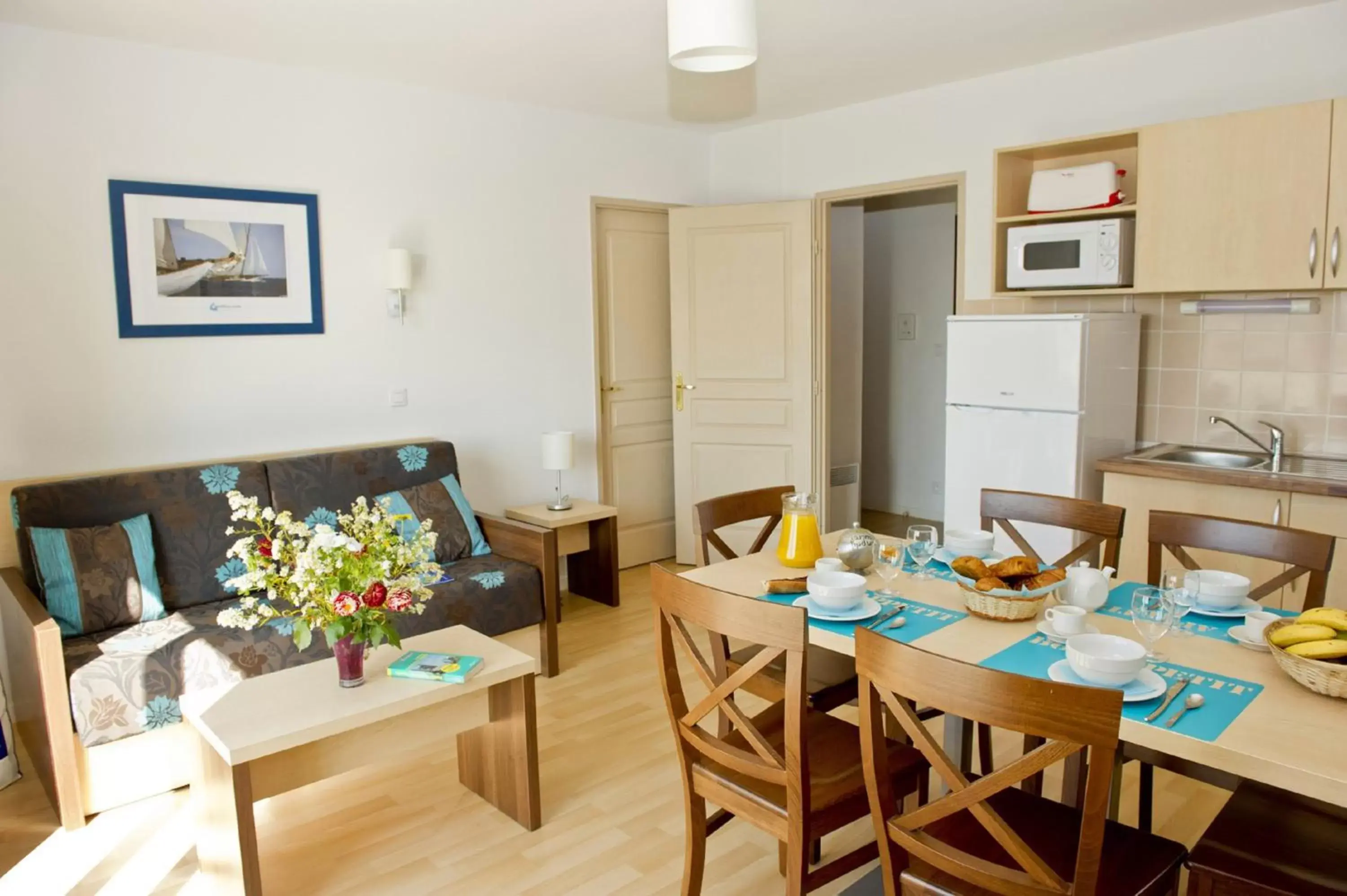 TV and multimedia, Dining Area in Résidence Goélia La Grande Plage