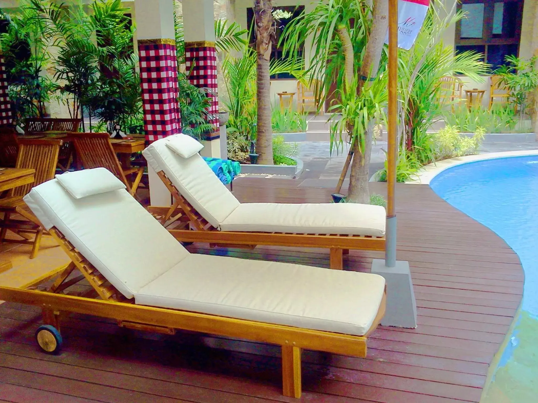 Balcony/Terrace, Swimming Pool in Manggar Indonesia Hotel