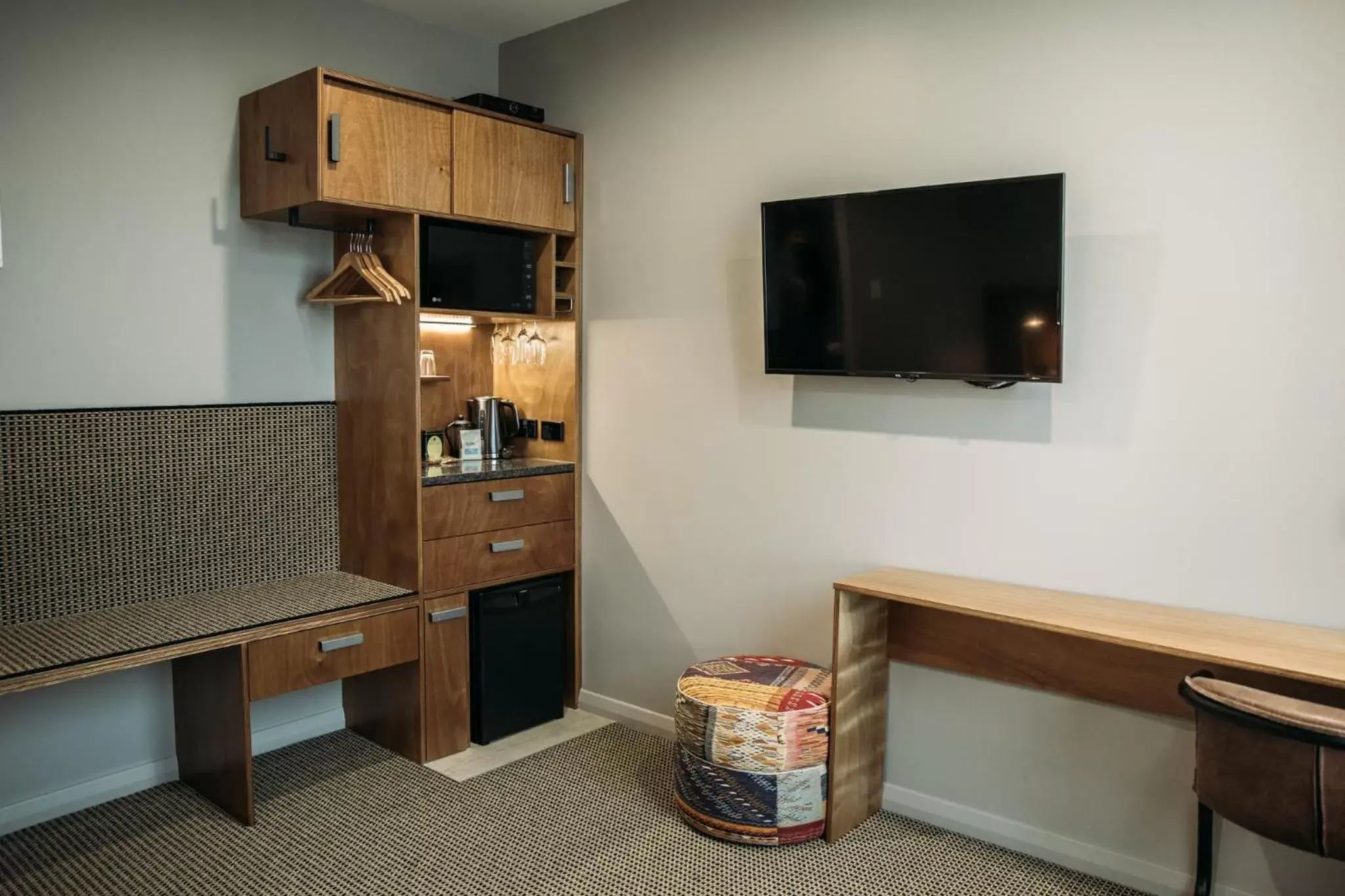 TV and multimedia, TV/Entertainment Center in King and Queen Hotel Suites