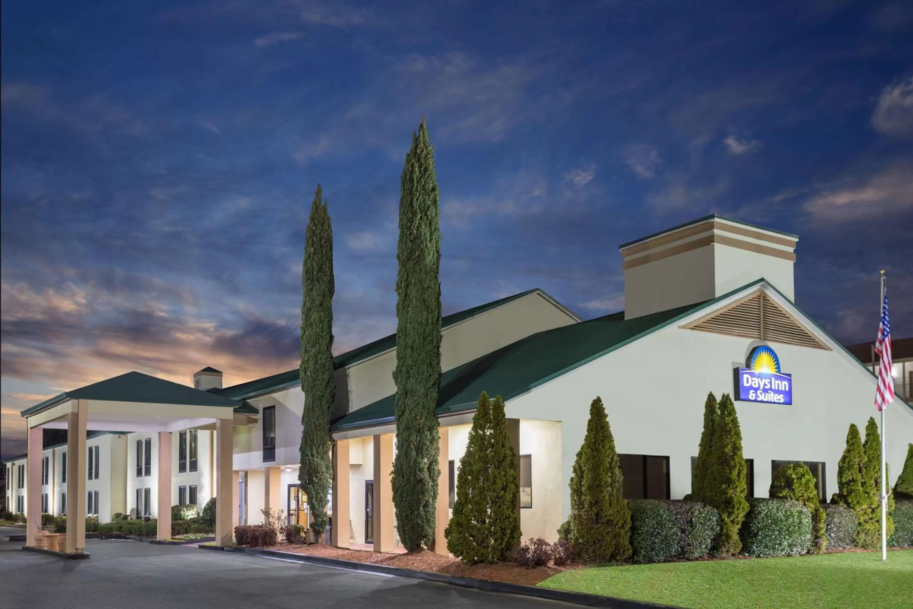 Property building in Days Inn & Suites by Wyndham Peachtree Corners Norcross