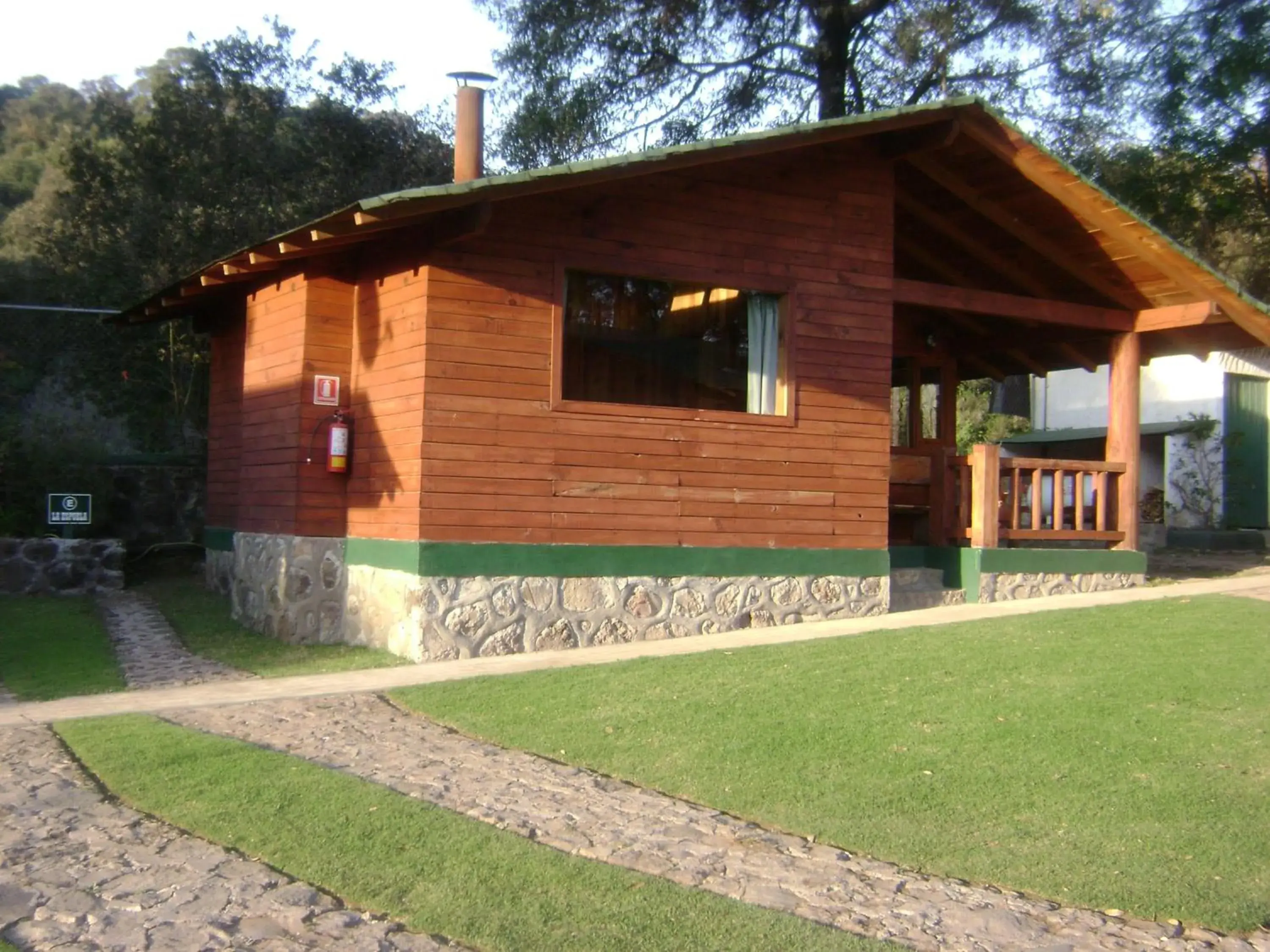 Facade/entrance, Property Building in Cabañas El Estribo Hotel