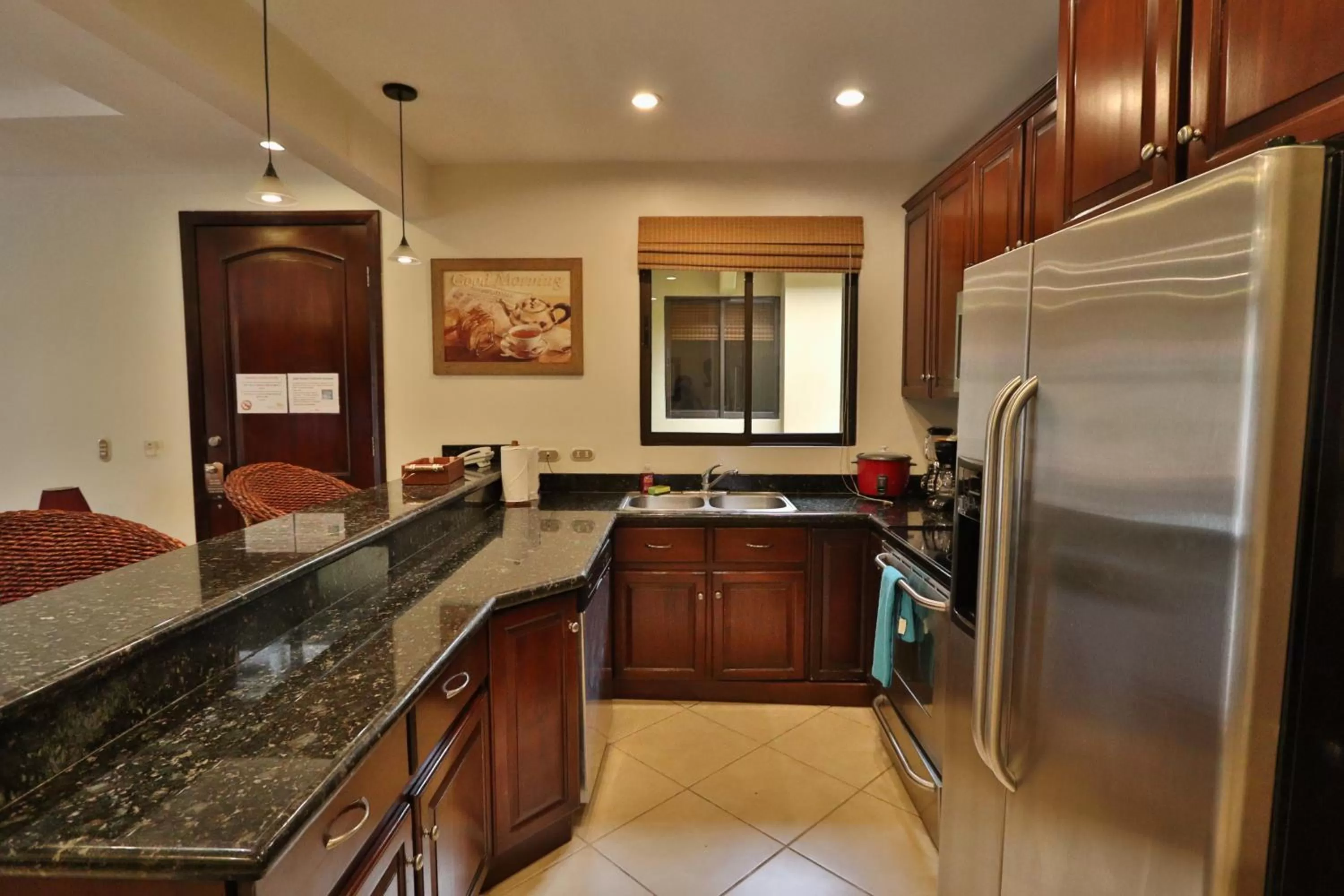 Kitchen or kitchenette in Monte Carlo Luxury Condominiums