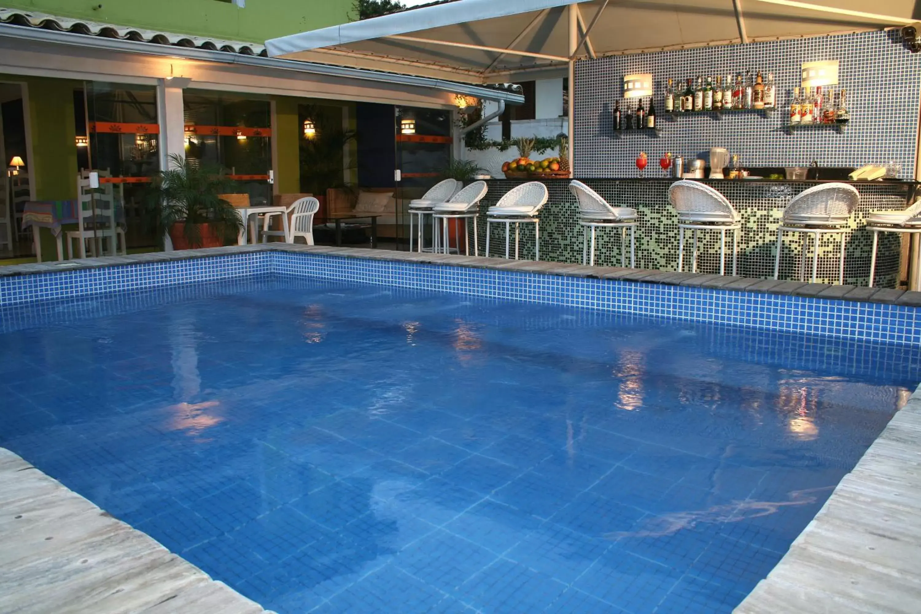 Lobby or reception, Swimming Pool in Pousada dos Reis