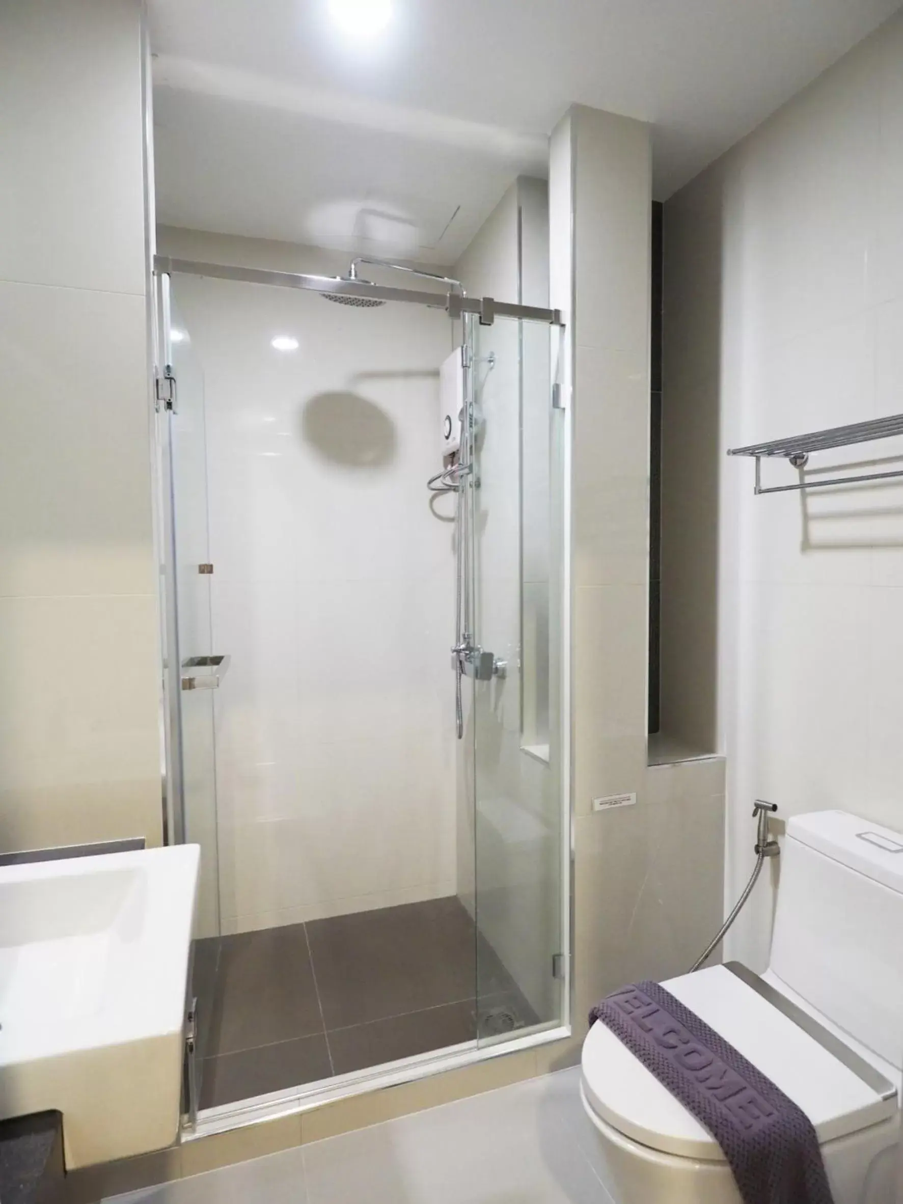 Bathroom in Clover Hotel Hatyai