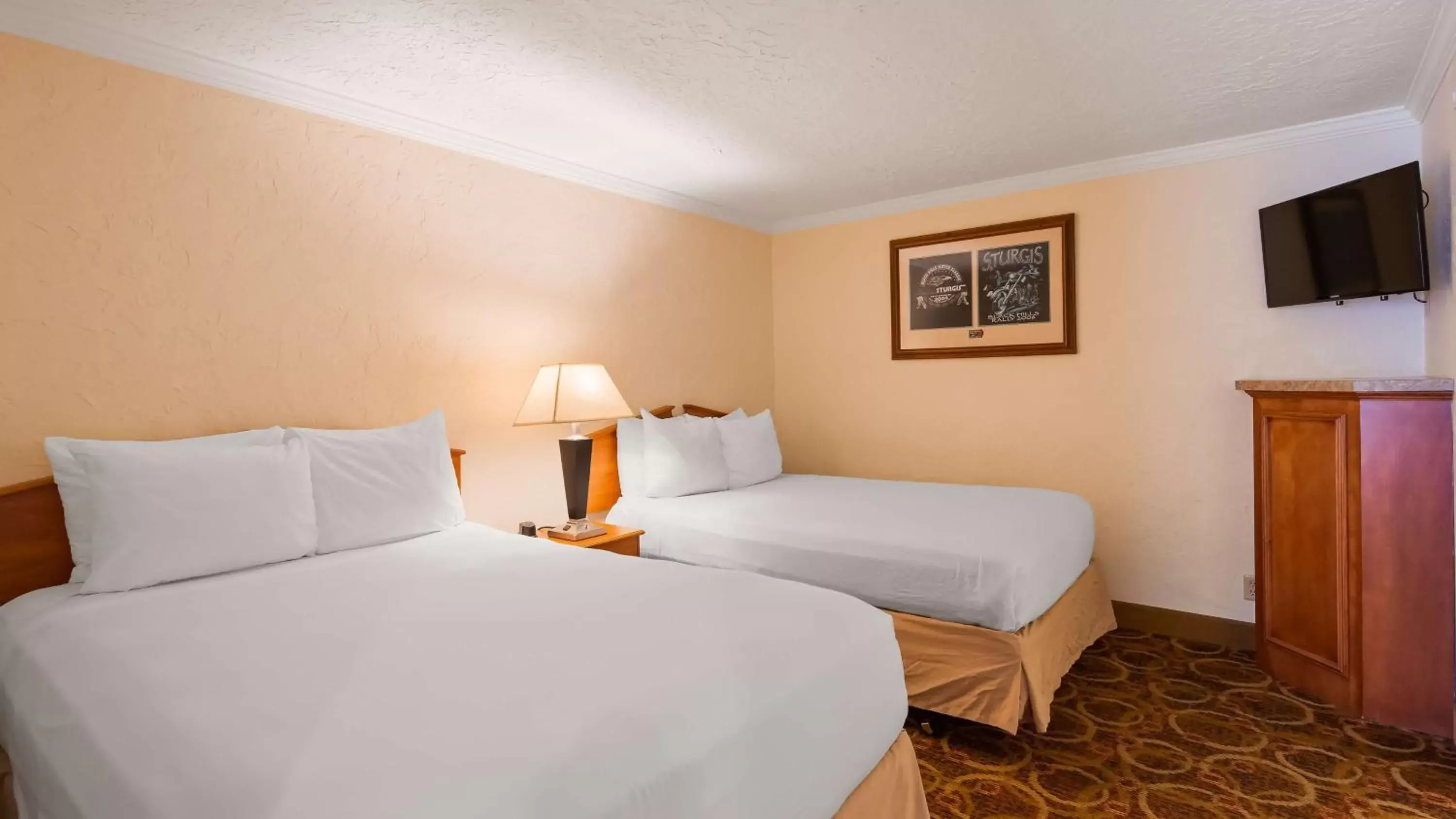 Photo of the whole room, Bed in Sturgis Lodge and Suites