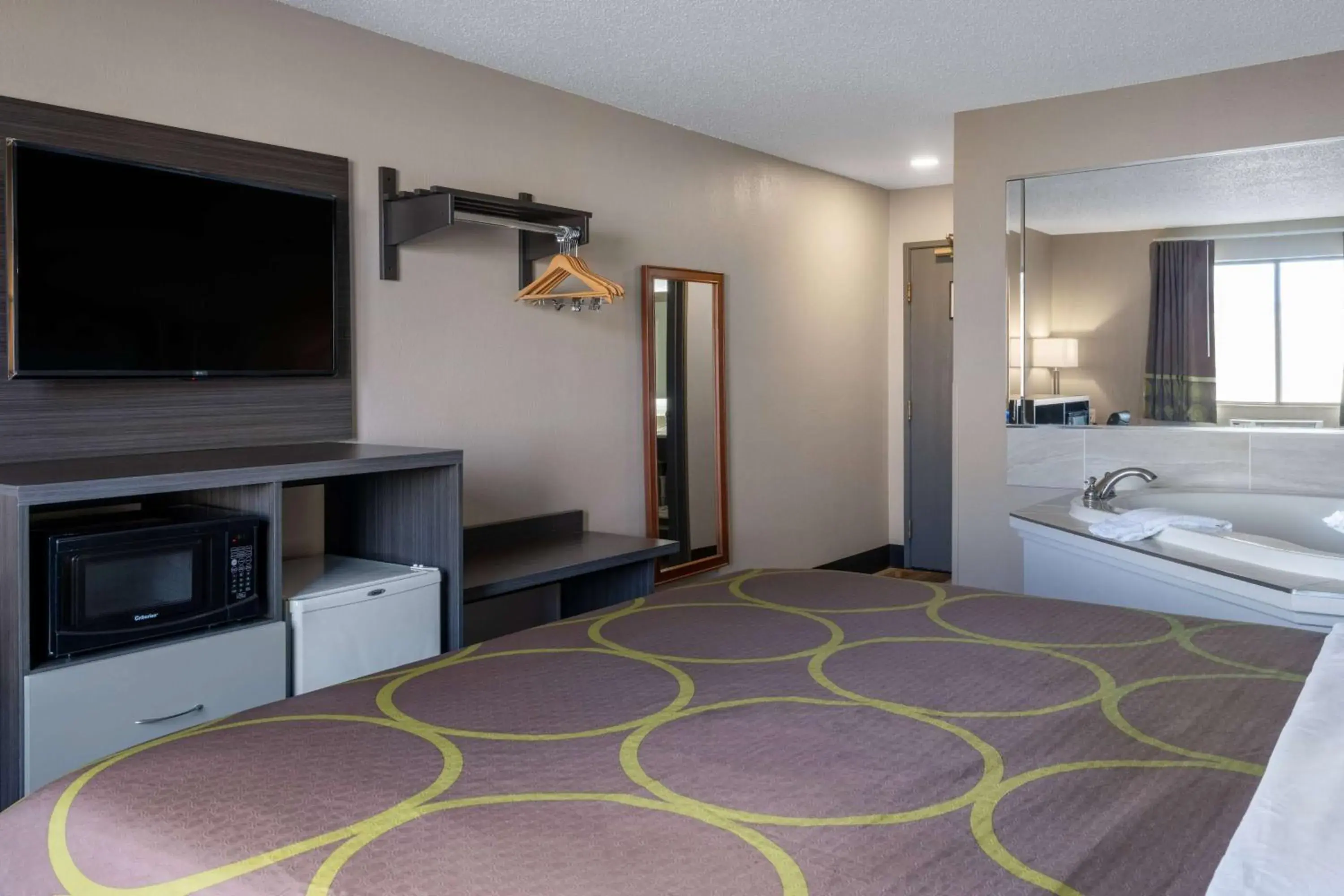 Bed, TV/Entertainment Center in Super 8 by Wyndham Merrillville