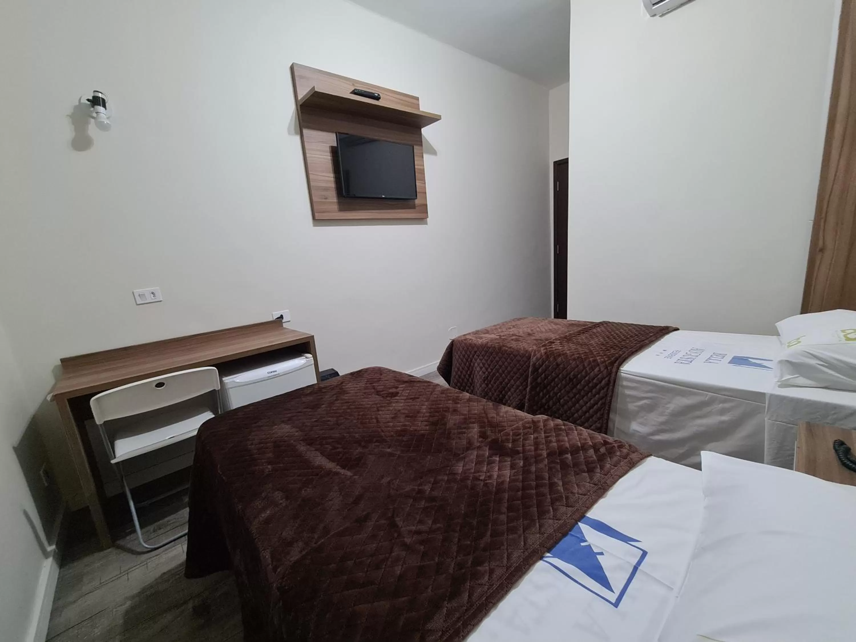 TV and multimedia, Bed in Bella Augusta Hotel