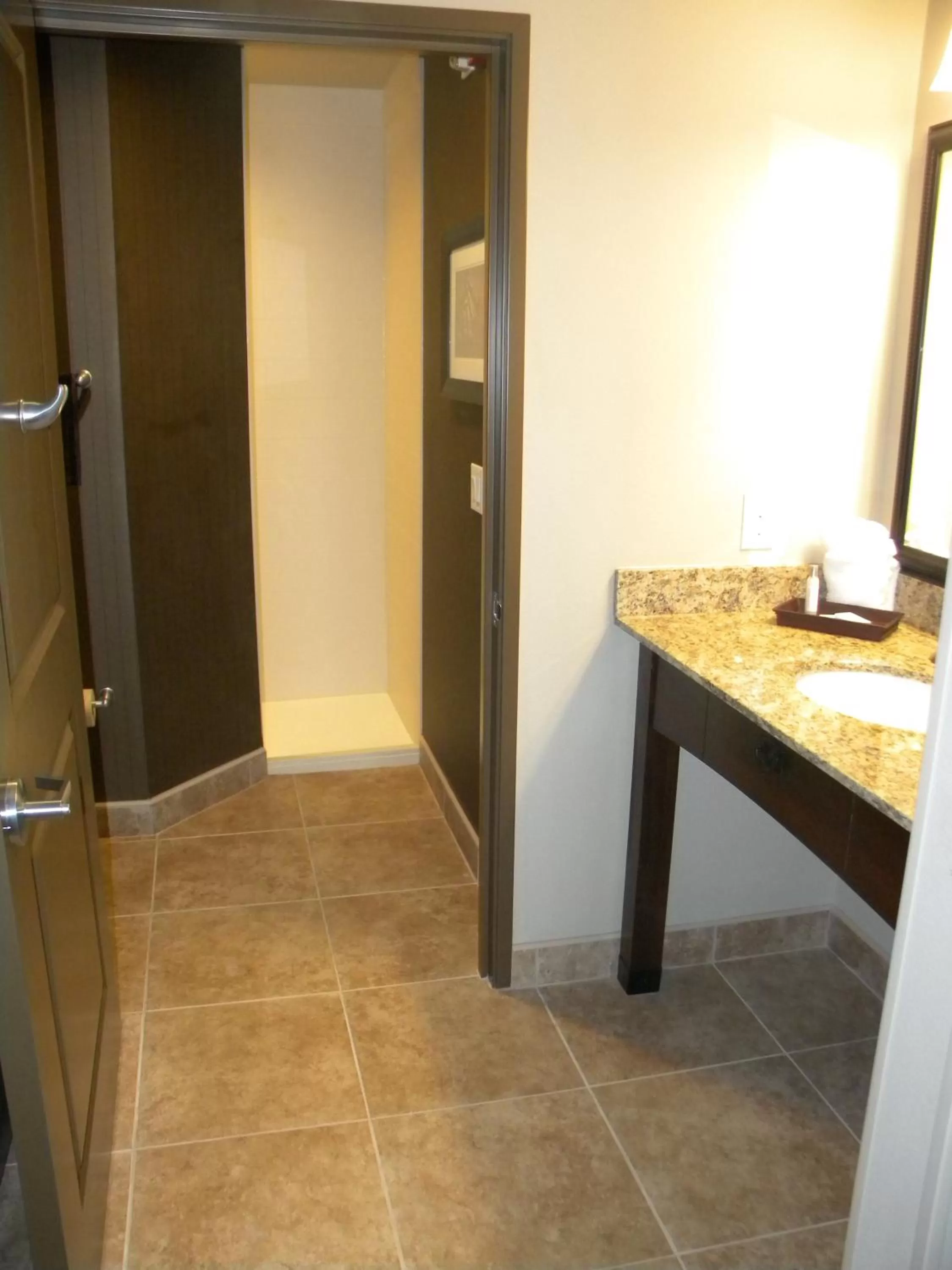 Bathroom in Teddy's Residential Suites Watford City
