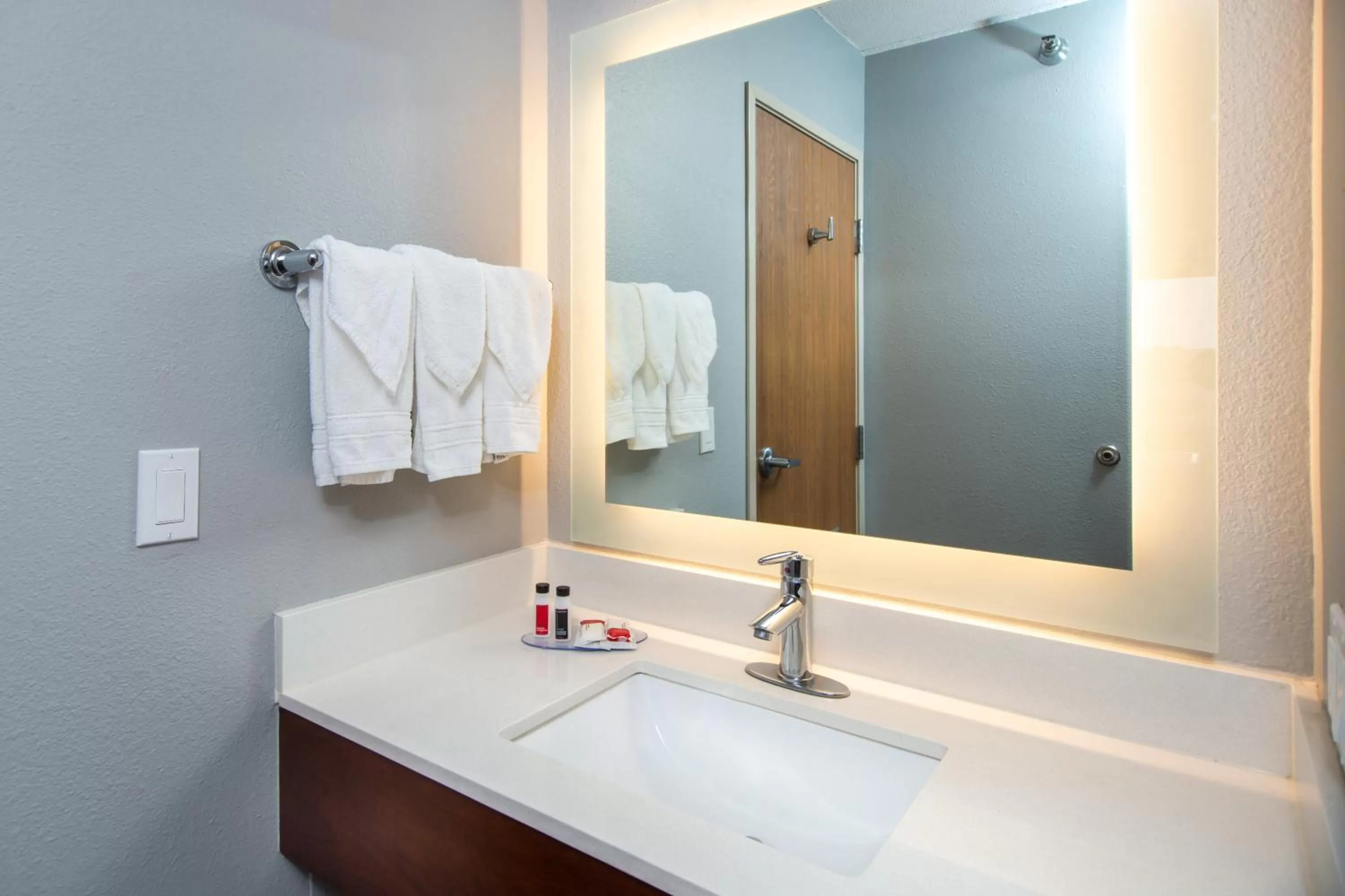 Bathroom in AmericInn by Wyndham Rapid City