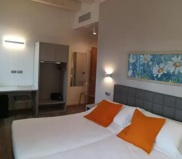 Bed in Hotel Quarcino