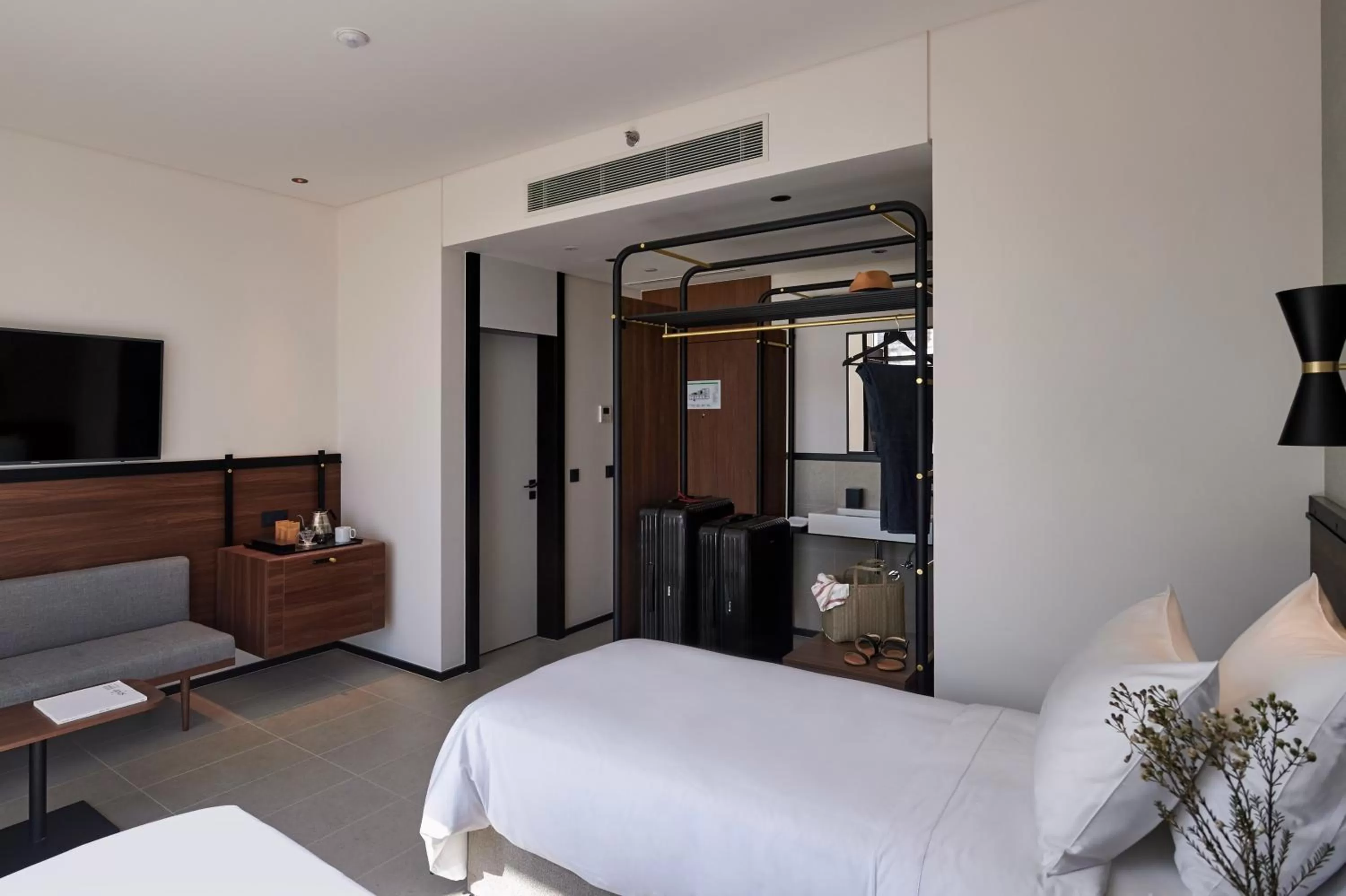 Bed in FORM Hotel Al Jaddaf, Dubai, a Member of Design Hotels