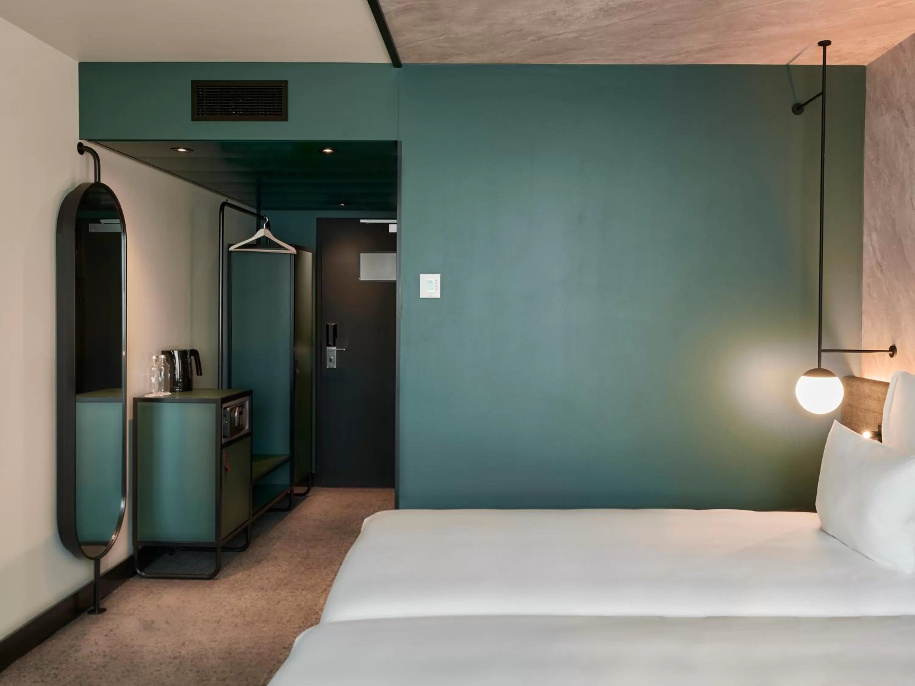 Bed in Novotel Bern Expo