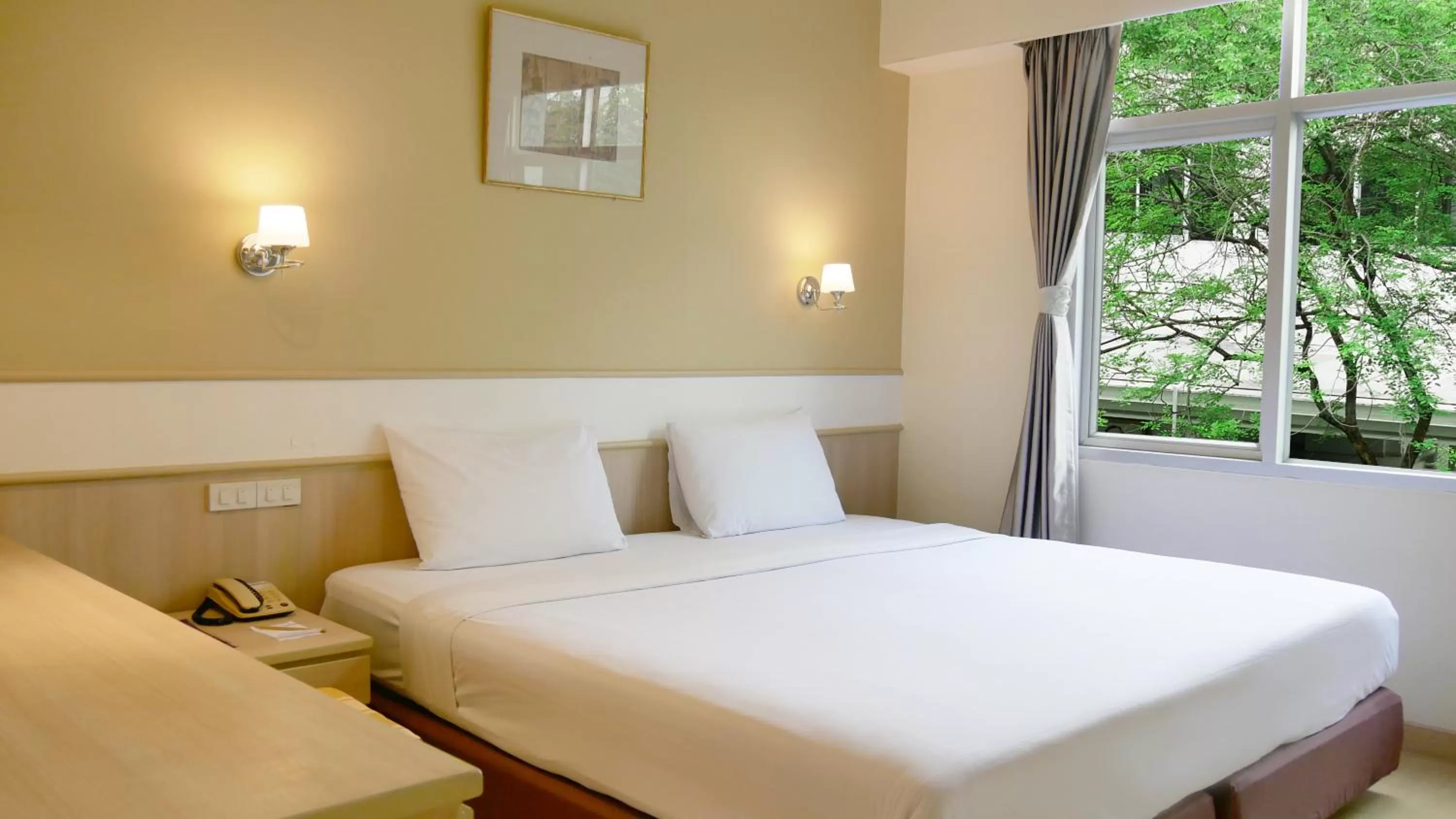 Bed in Trang Hotel Bangkok - SHA Plus