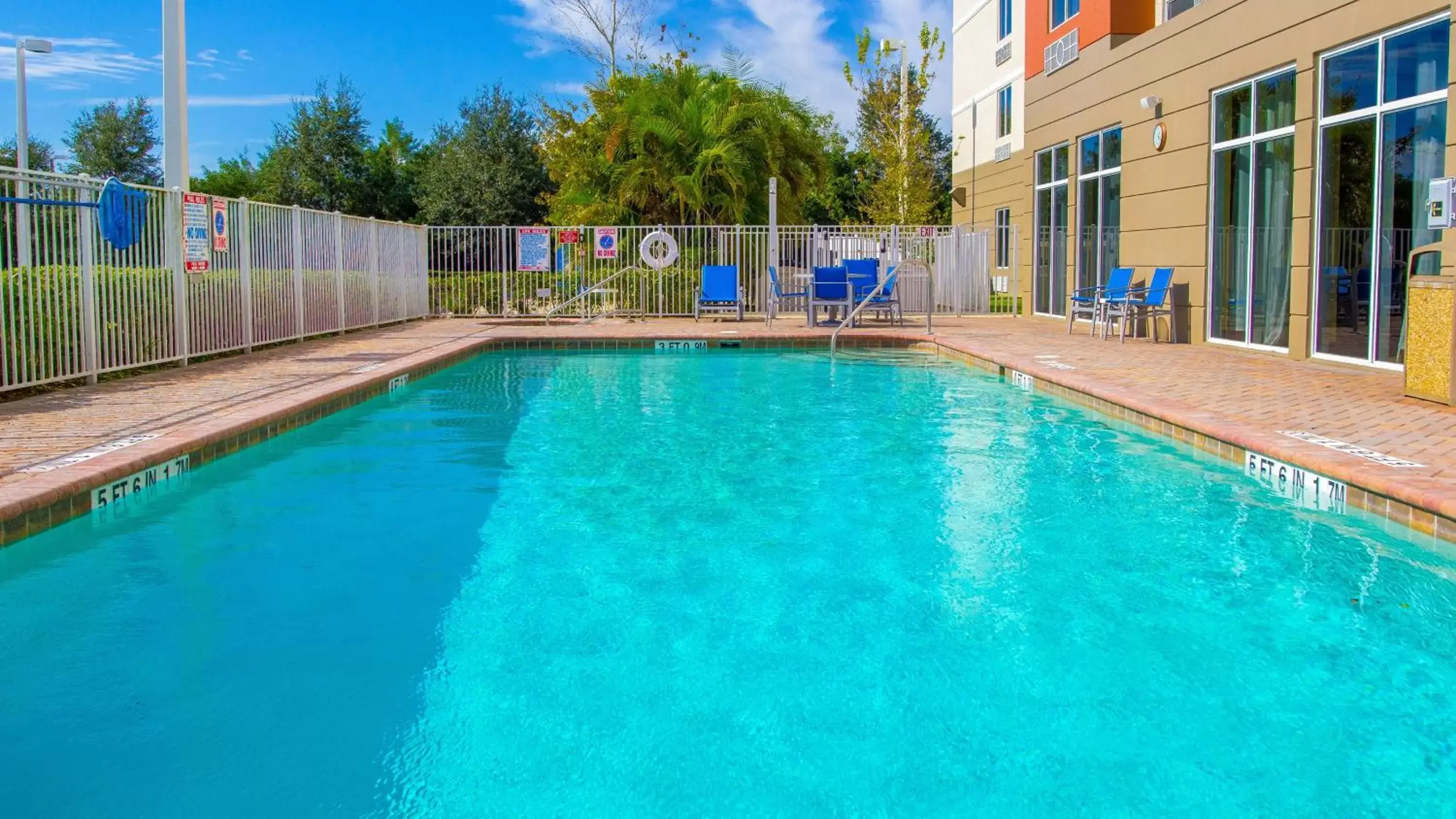 Swimming Pool in Holiday Inn Express Hotel & Suites Palm Bay, an IHG Hotel