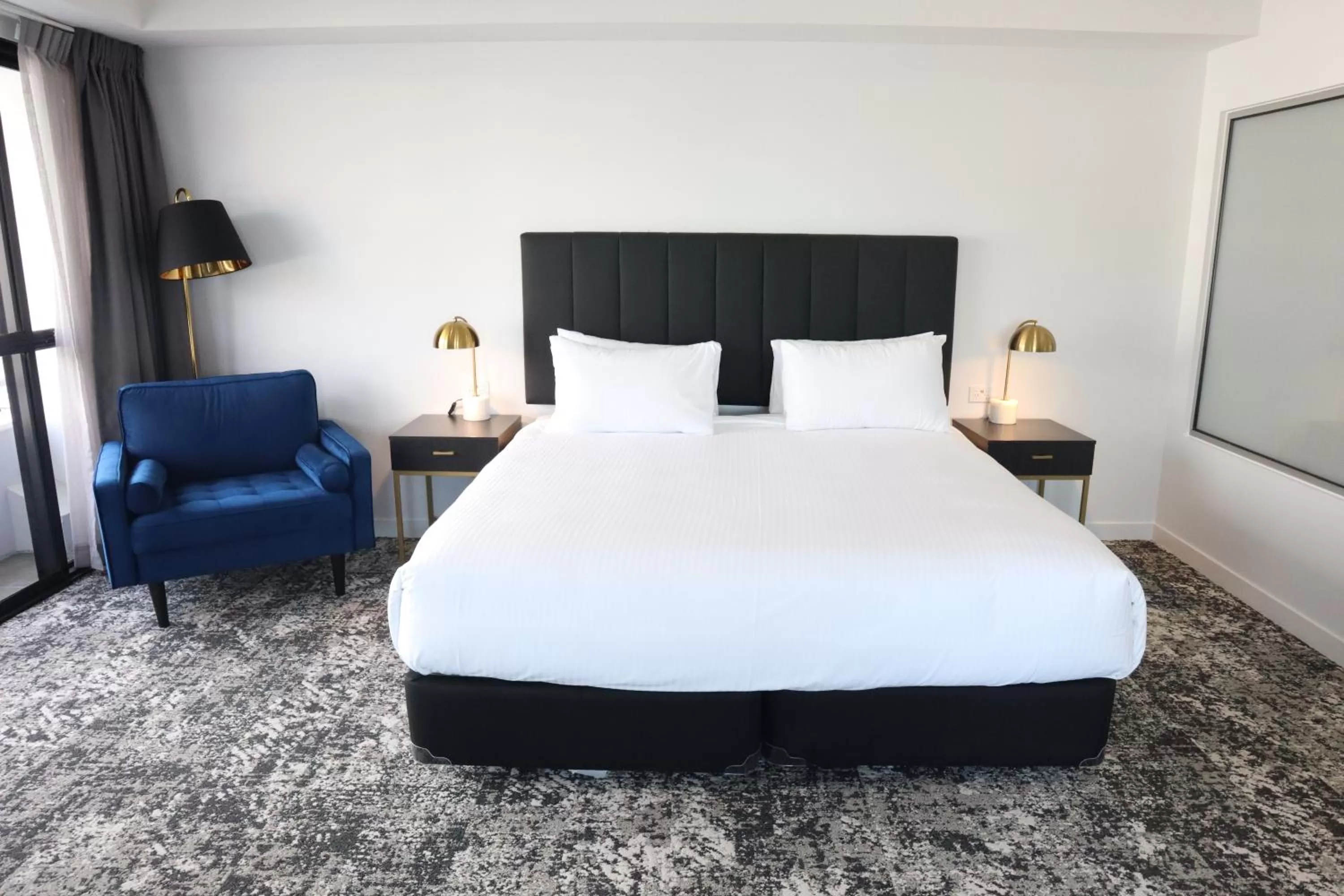 Bed in The Benson Hotel