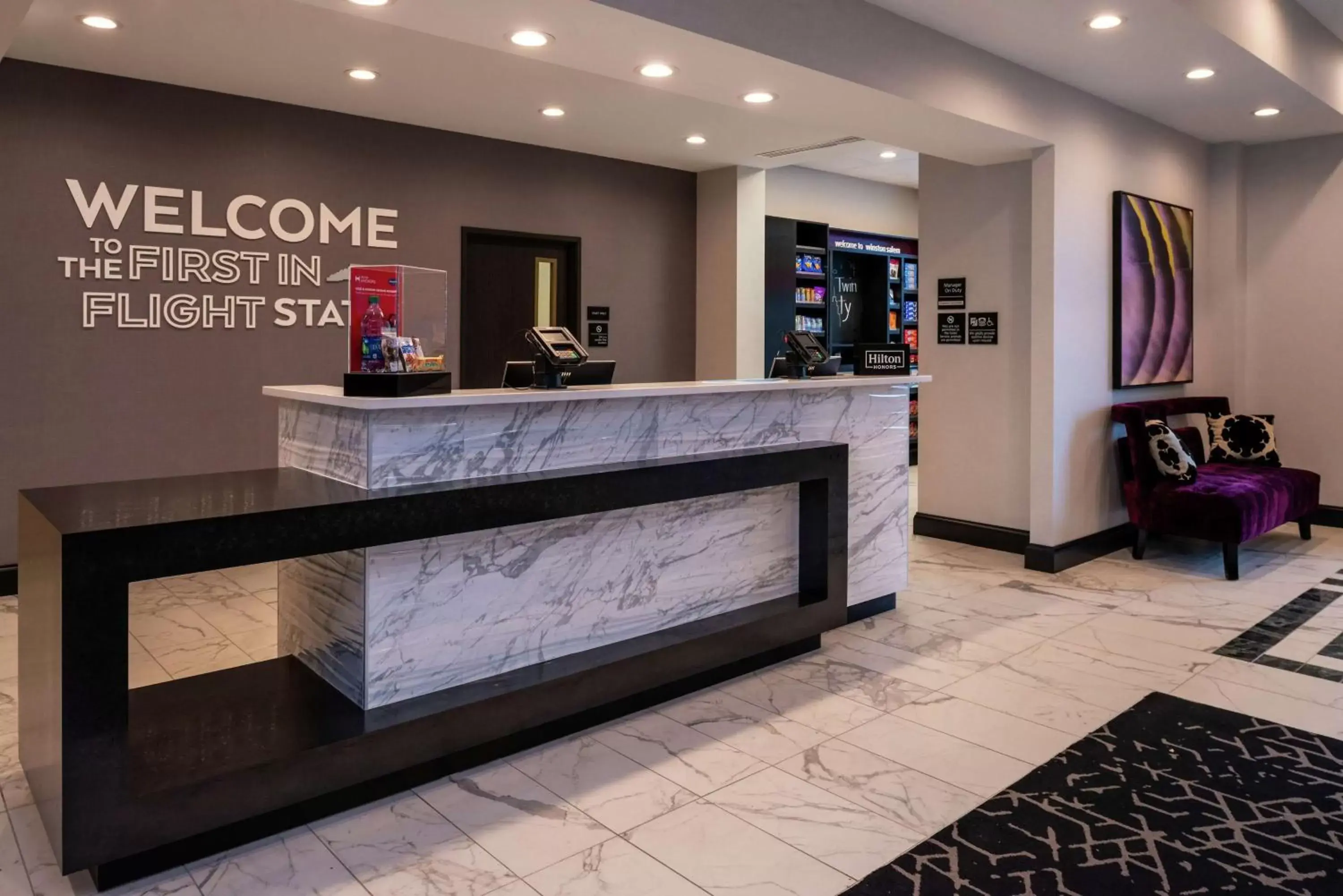 Lobby or reception in Hampton Inn & Suites Winston-Salem Downtown Lobby or reception in Hampton Inn & Suites Winston-Salem Downtown